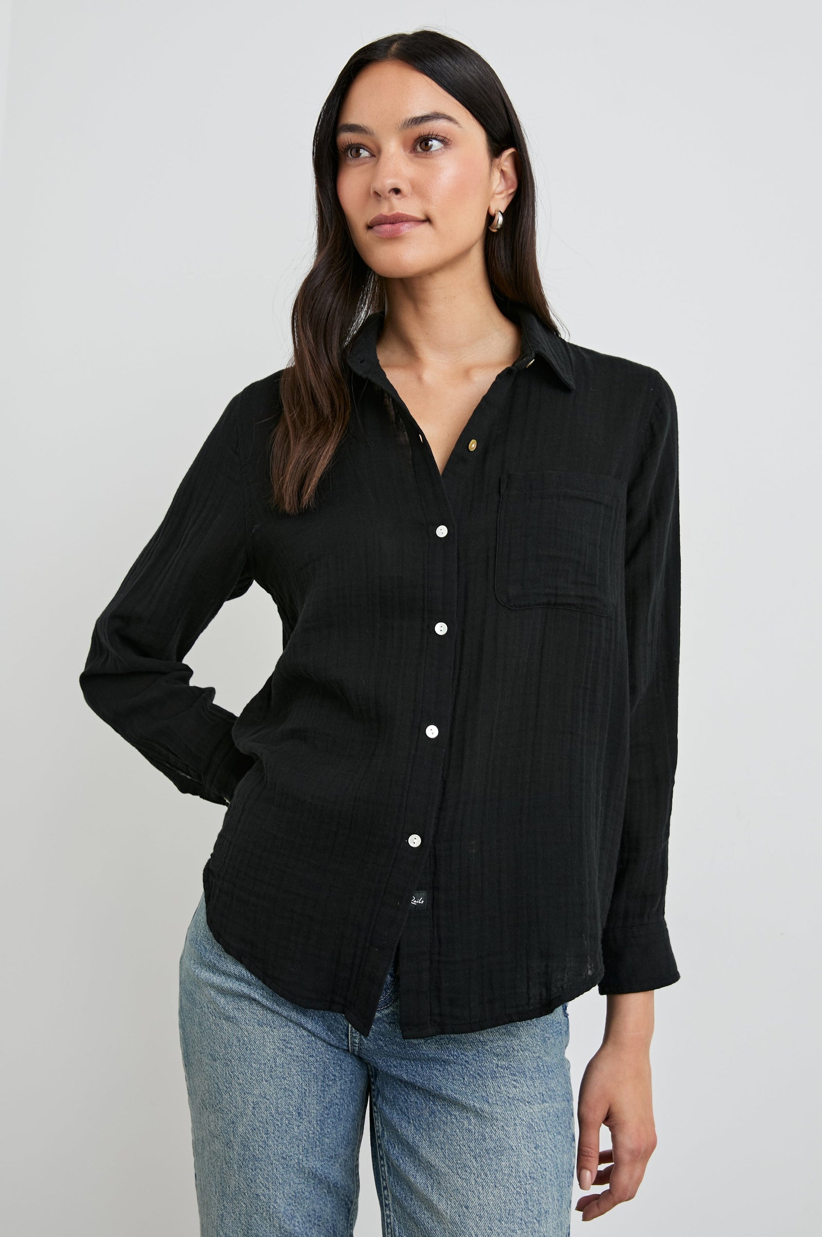 Ellis Long-Sleeve Button Down with Cuffs and a Front Chest Pocket in Black Colorway - Front Untucked View Featured on Model