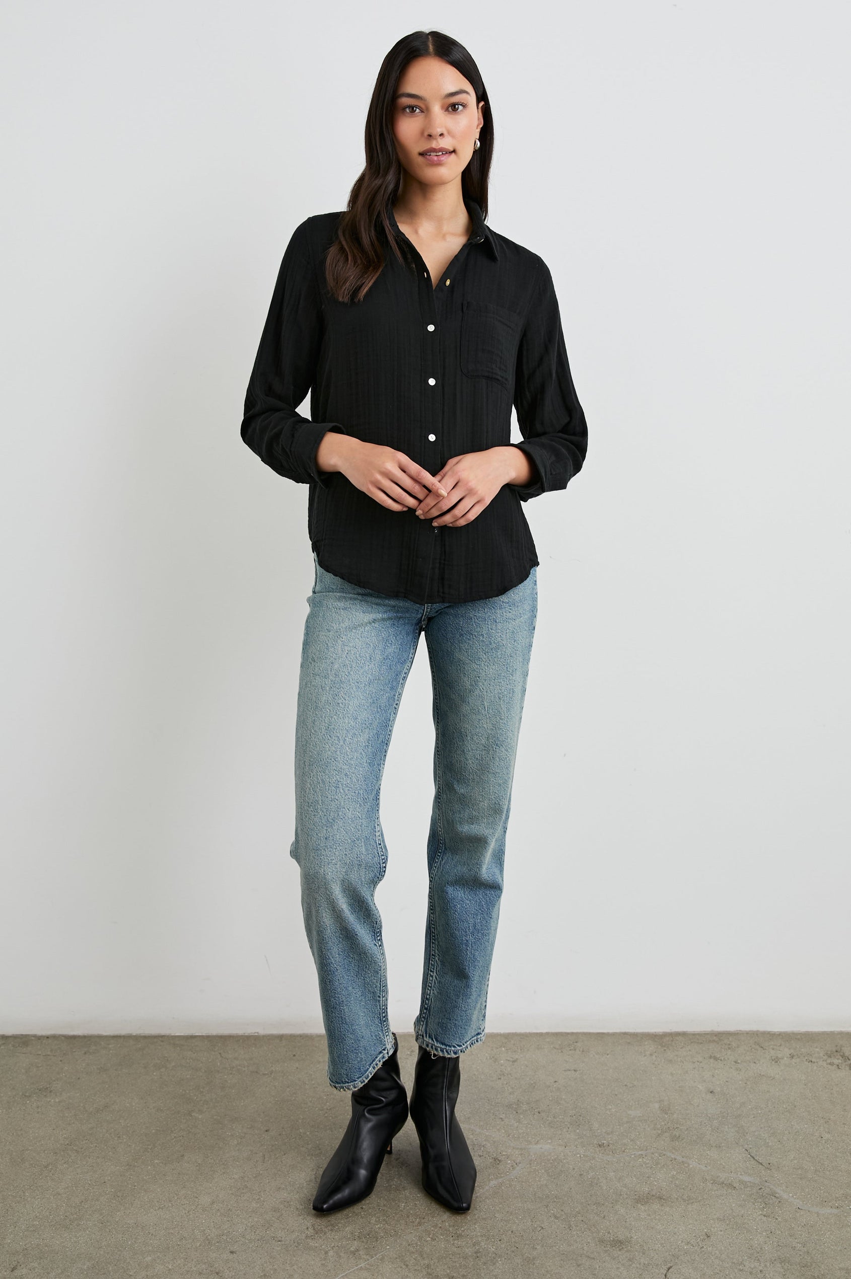 Ellis Long-Sleeve Button Down with Cuffs and a Front Chest Pocket in Black Colorway - Front Untucked Full Body View Featured on Model