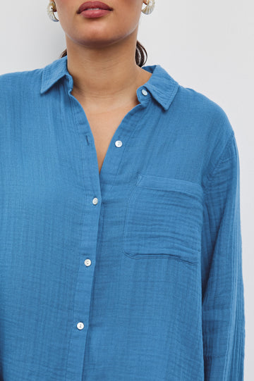 Ellis Relaxed Collared Button Front Shirt with Long Sleeves and a Chest Pocket in French Blue Colorway. Front Detailed View Shown on Model.