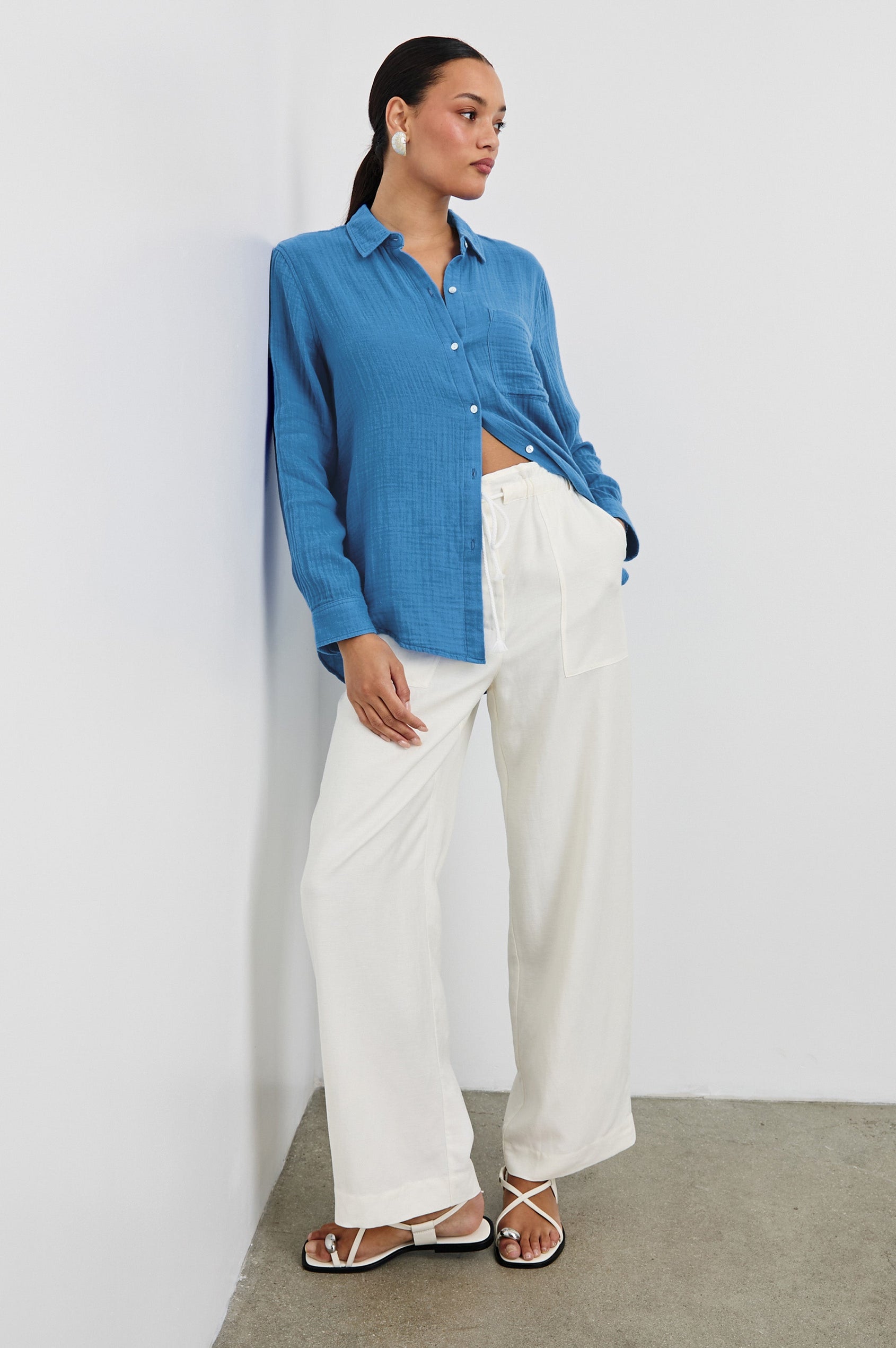 Ellis Relaxed Collared Button Front Shirt with Long Sleeves and a Chest Pocket in French Blue Colorway. Full Body Front View Shown on Model.