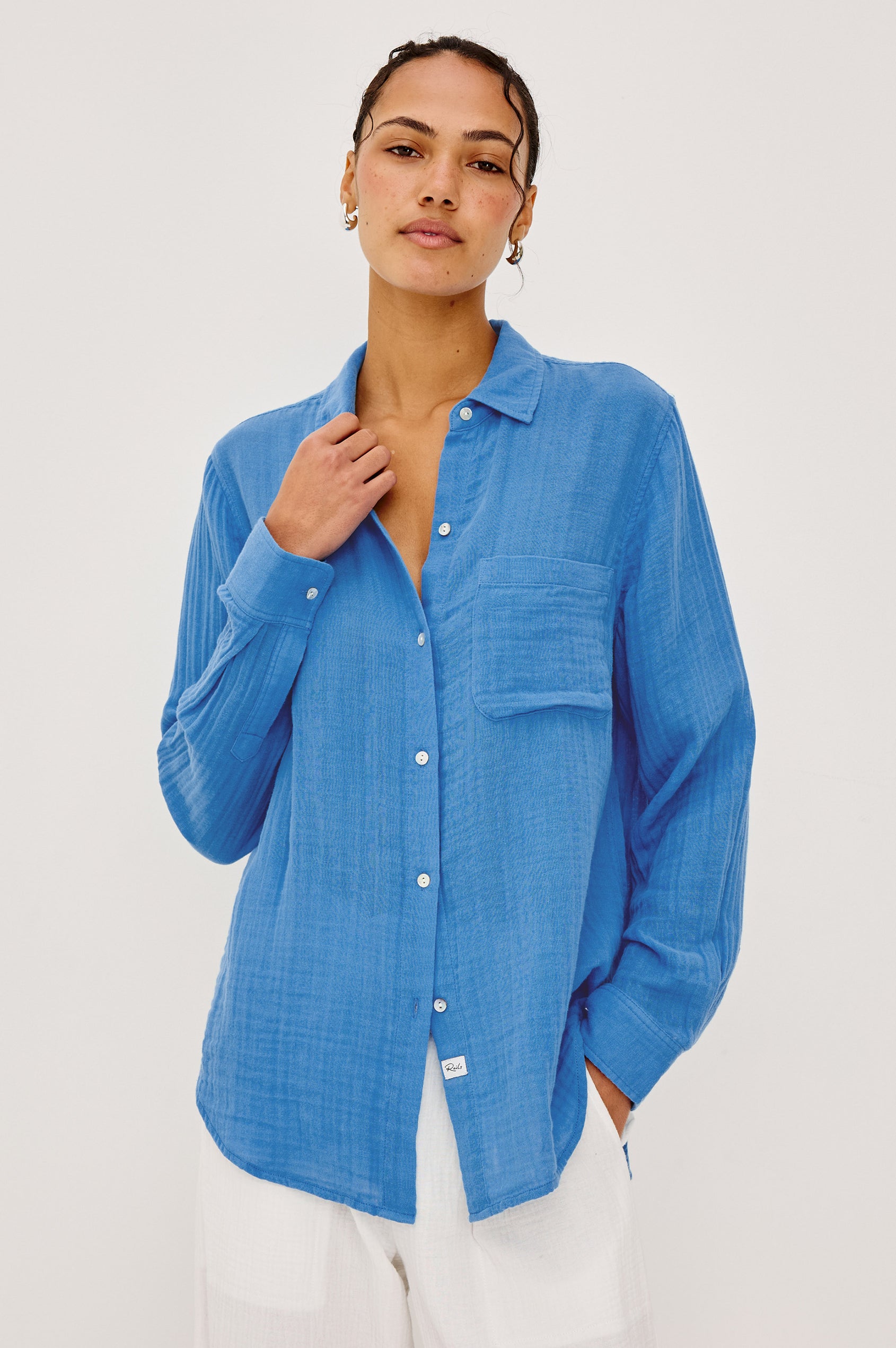 Ellis Button-Up Shirt in Organic Cotton Gauze With Relaxed Fit, Chest Patch Pocket, and Long Sleeves in French Blue Colorway - Upper Body Front View Featured on Model