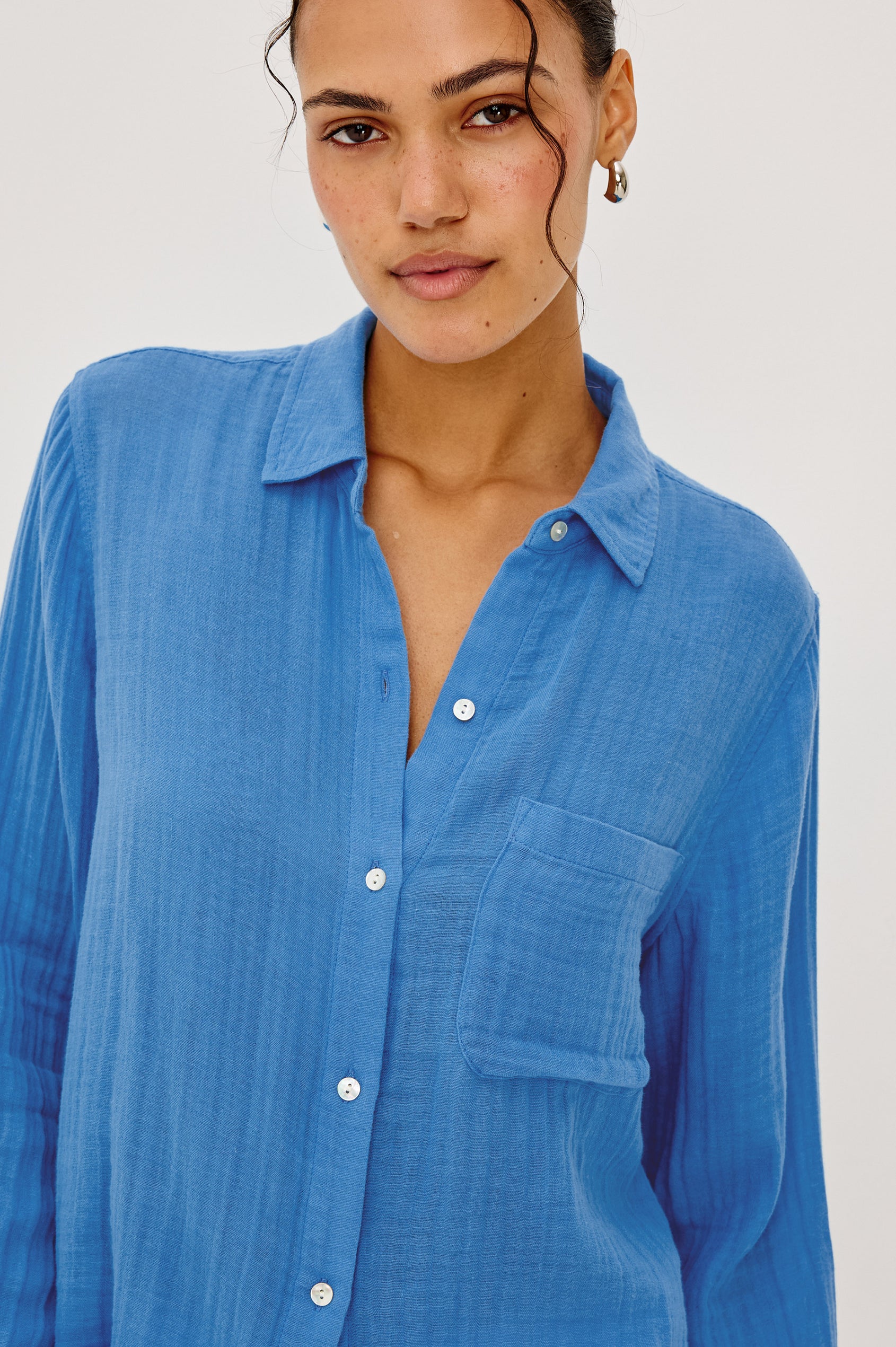 Ellis Button-Up Shirt in Organic Cotton Gauze With Relaxed Fit, Chest Patch Pocket, and Long Sleeves in French Blue Colorway - Upper Body Back View Featured on Model