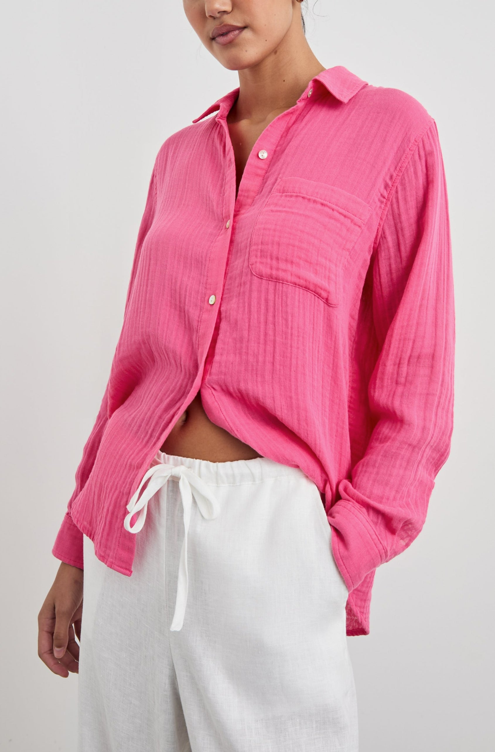 Ellis Long-Sleeve Button Down with Cuffs and a Patch Chest Pocket in Hibiscus Colorway - Front tucked View Featured on Model
