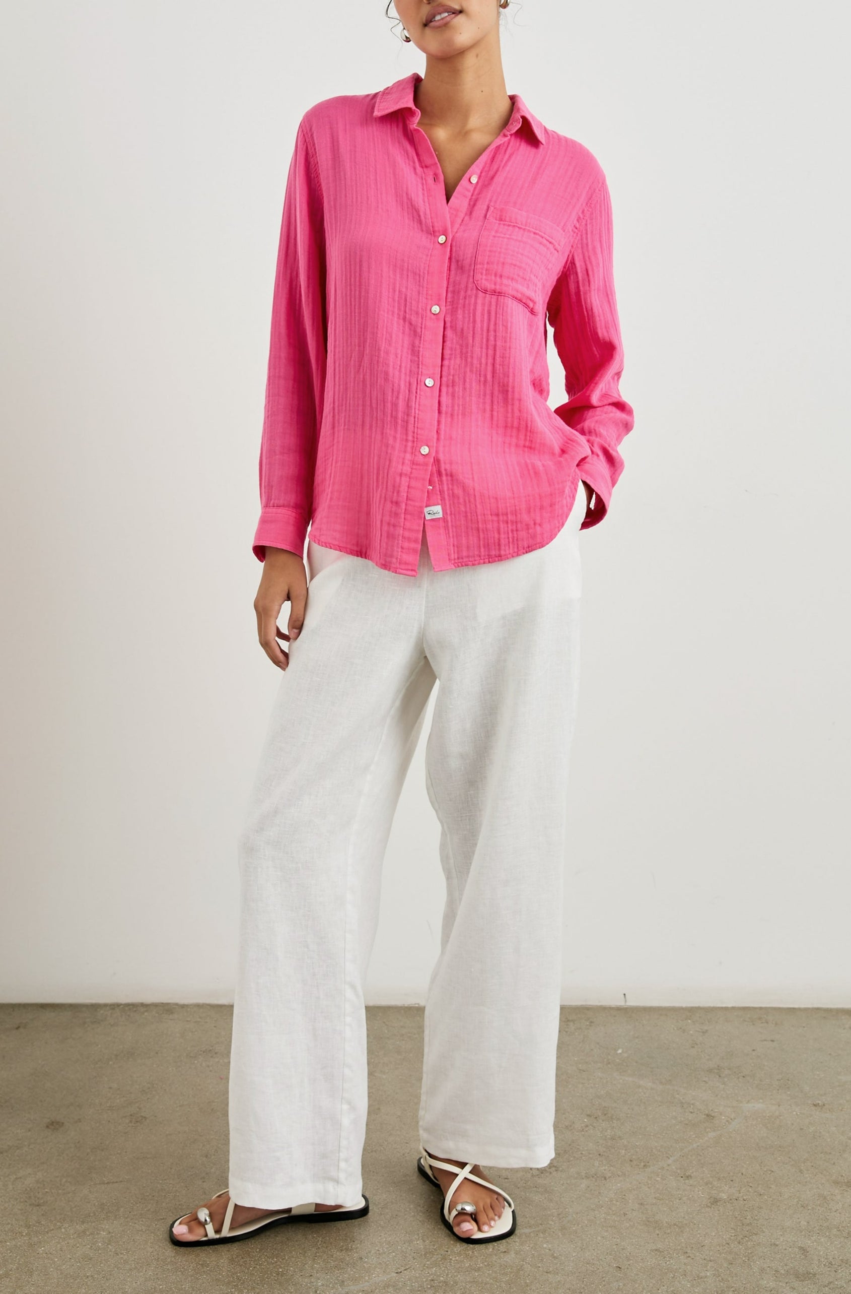 Ellis Long-Sleeve Button Down with Cuffs and a Patch Chest Pocket in Hibiscus Colorway - Front Untucked Full body View Featured on Model