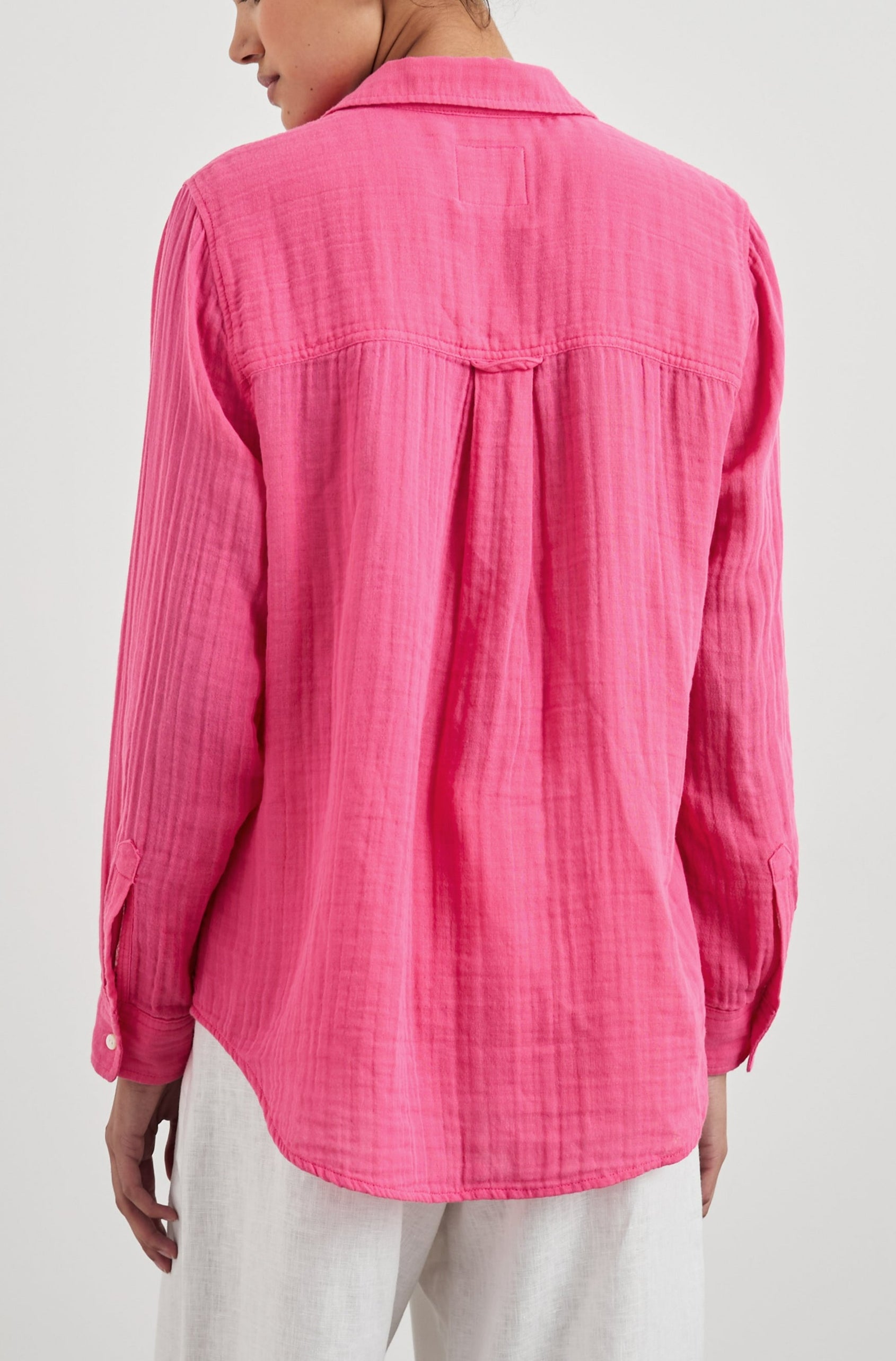 Ellis Long-Sleeve Button Down with Cuffs and a Patch Chest Pocket in Hibiscus Colorway - Back Untucked View Featured on Model