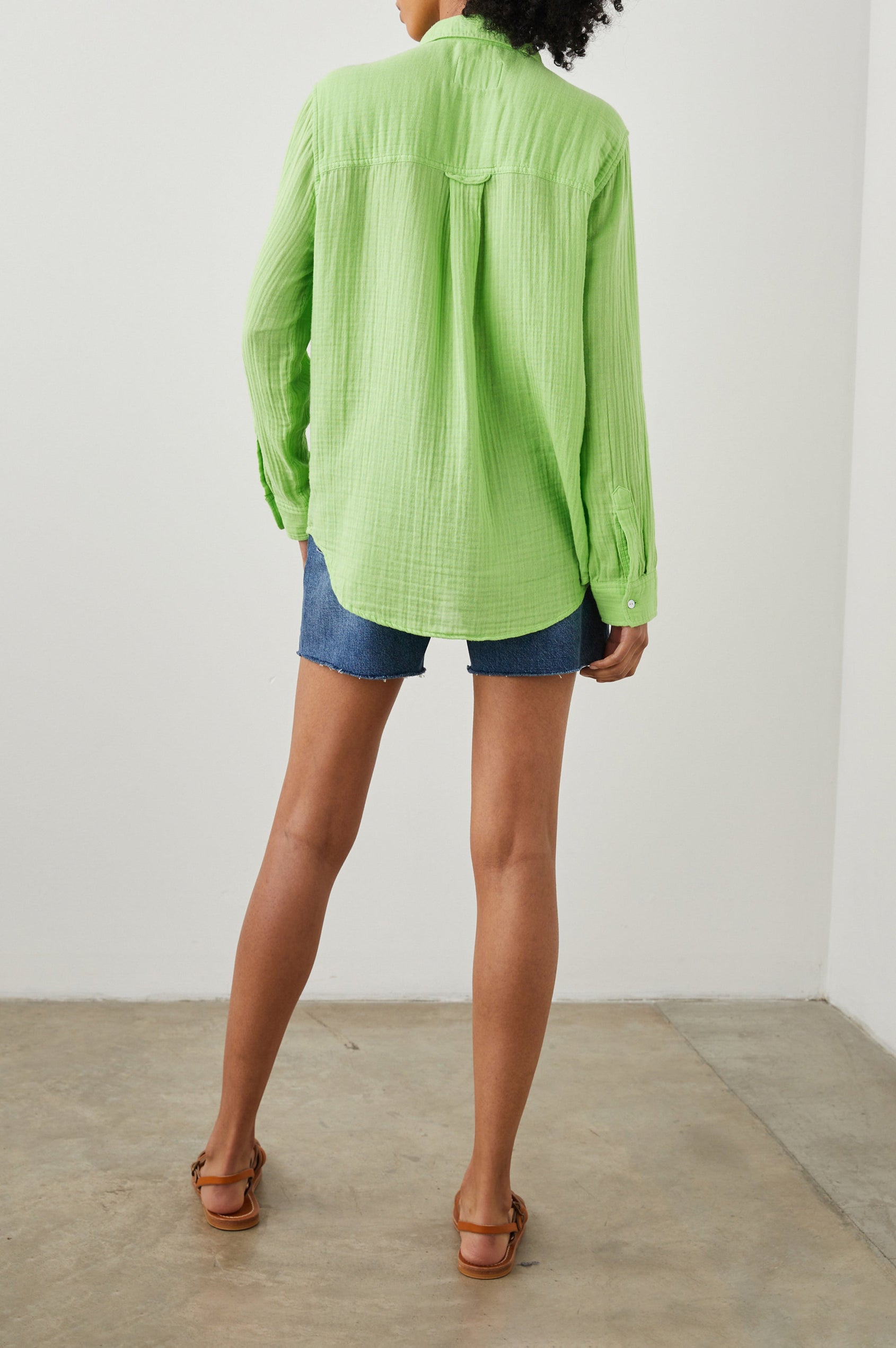 Ellis Long-Sleeve Button Down with Cuffs and a Patch Chest Pocket in Jade Lime Colorway - Back untucked Full Body View Featured on Model
