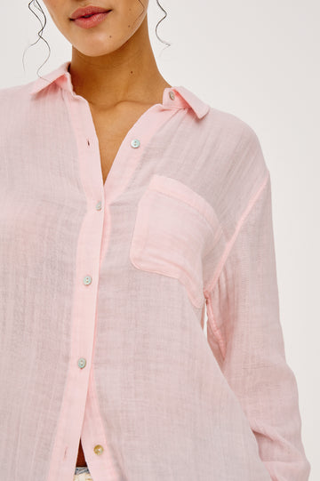 Ellis Relaxed Collared Button Front Shirt with Long Sleeves and a Chest Pocket in Baby Pink Colorway. Full Body Front View Details Zoomed In Shown on Model.