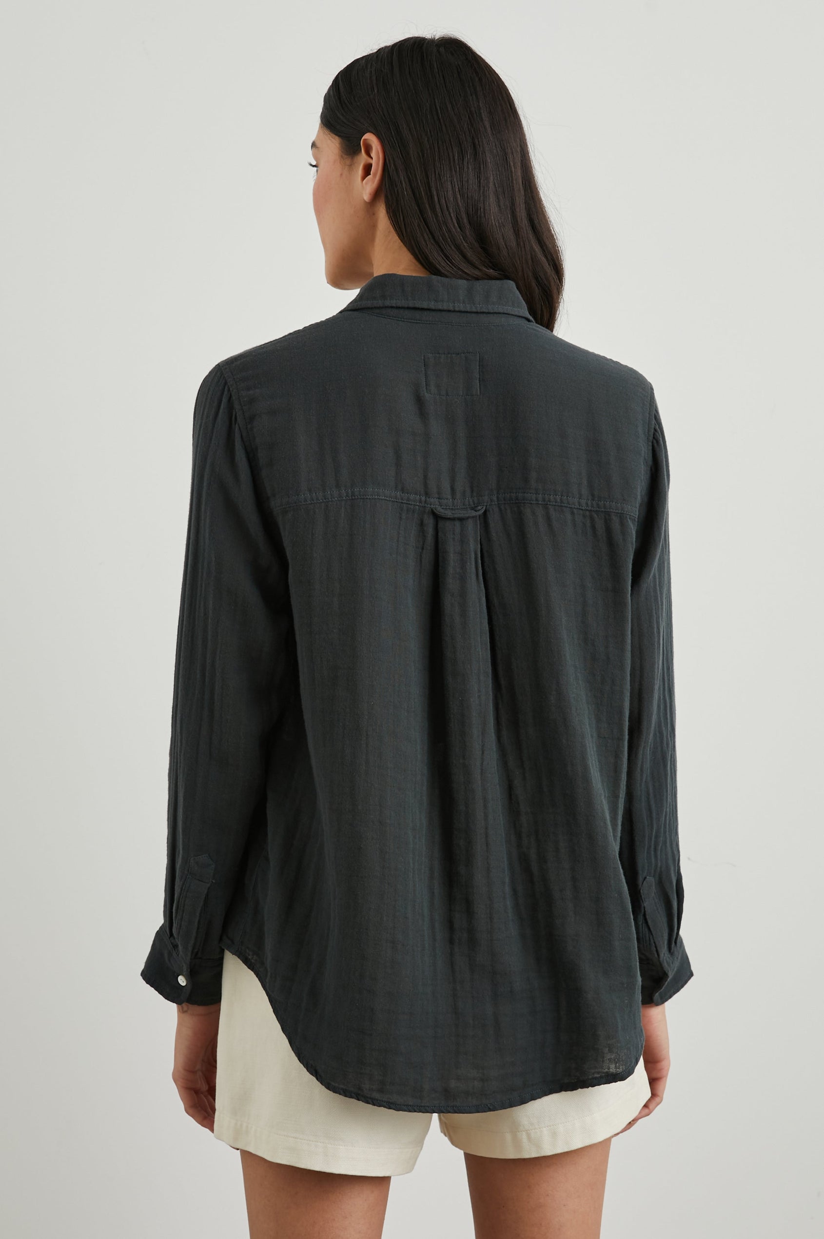 Ellis Long-Sleeve Button Down with Cuffs and a Patch Chest Pocket in Washed Black Colorway - Back View Featured on Model