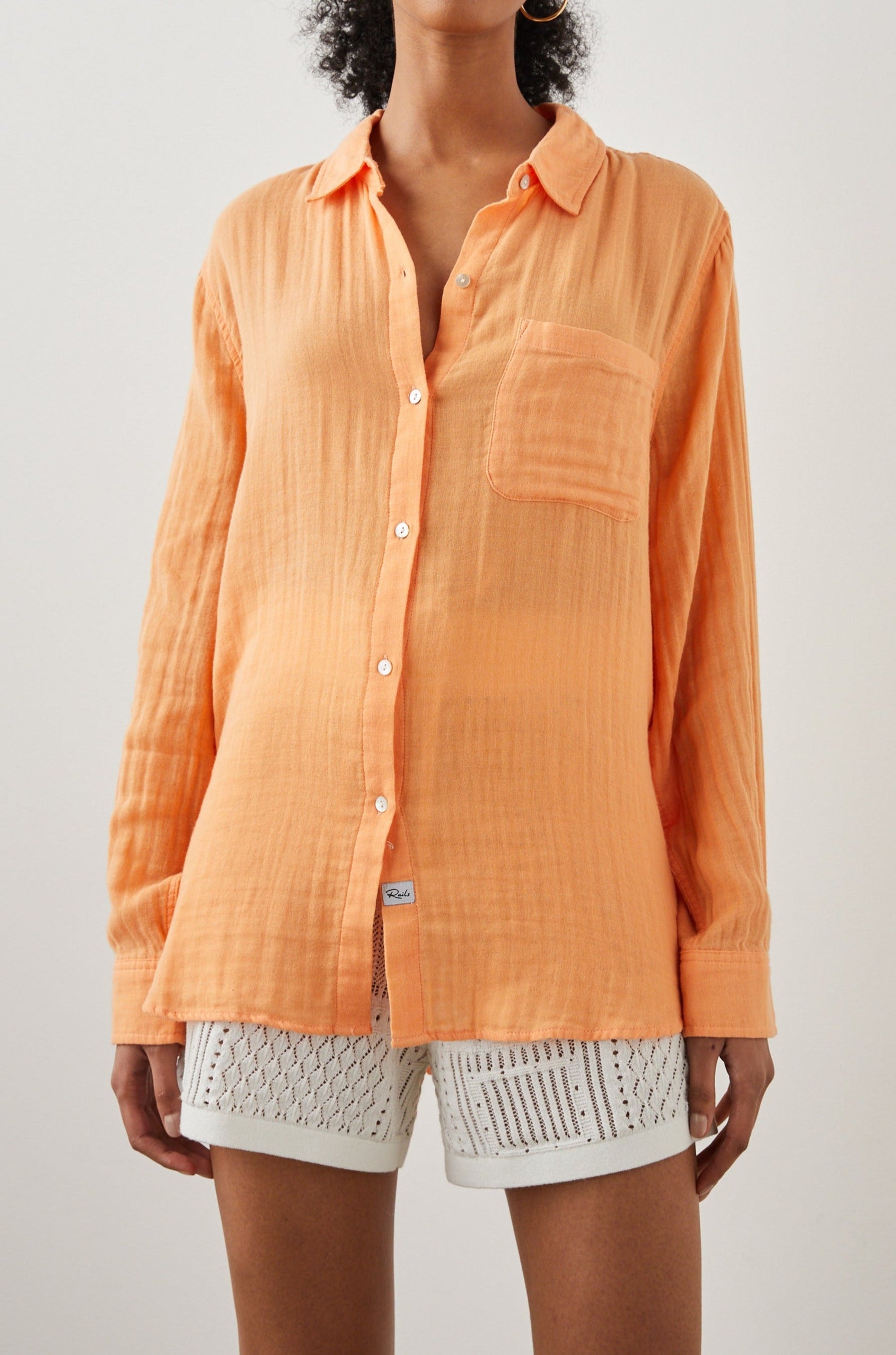 Ellis Long-Sleeve Button Down with Cuffs and a Patch Chest Pocket in Papaya Colorway - Front View Featured on Model