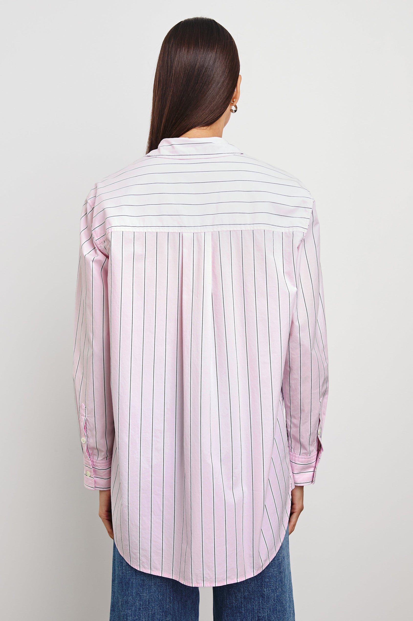 Elsa Long-Sleeve Button Down Shirt with Chest Patch Pocket in Cherry Blossom Stripe Colorway, Thin Black and White Vertical Stripes on Pink - Back Untucked View Featured on Model