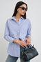 Elsa Long-Sleeve Button Down Shirt with Chest Patch Pocket in Mariner White Stripe Colorway, Vertical Blue and White Stripes - Front View Featured on Model