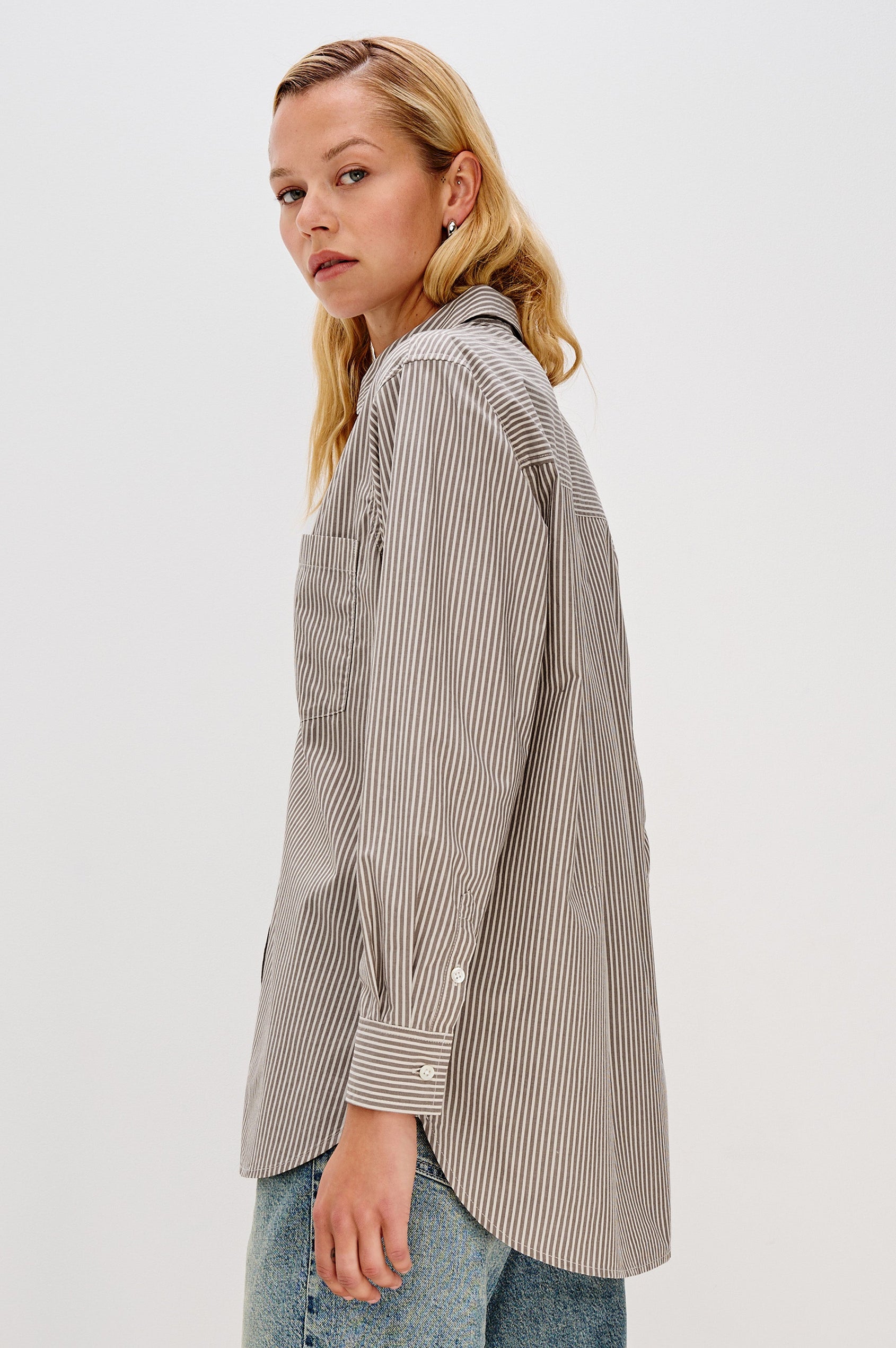 Elsa Oversized Long Sleeve Button Down Shirt With Collar And Cuffs In Noir Stripe Colorway - Side View Featured on Model