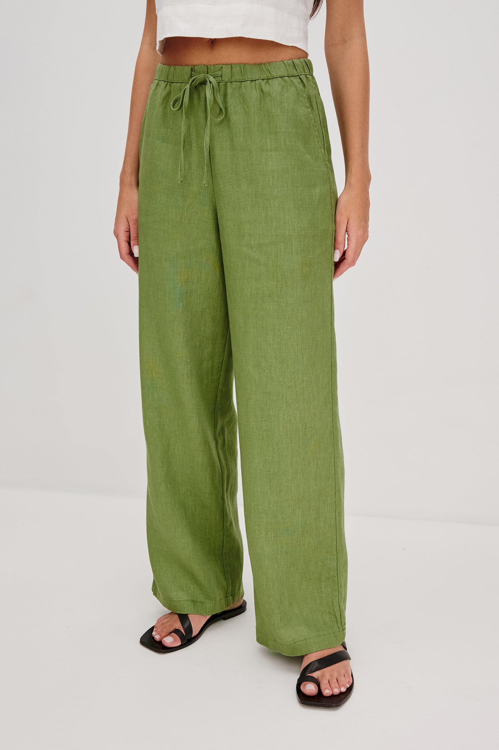 Emmie high rise linen wide leg pant with drawstring in Dill colorway- front view on model.
