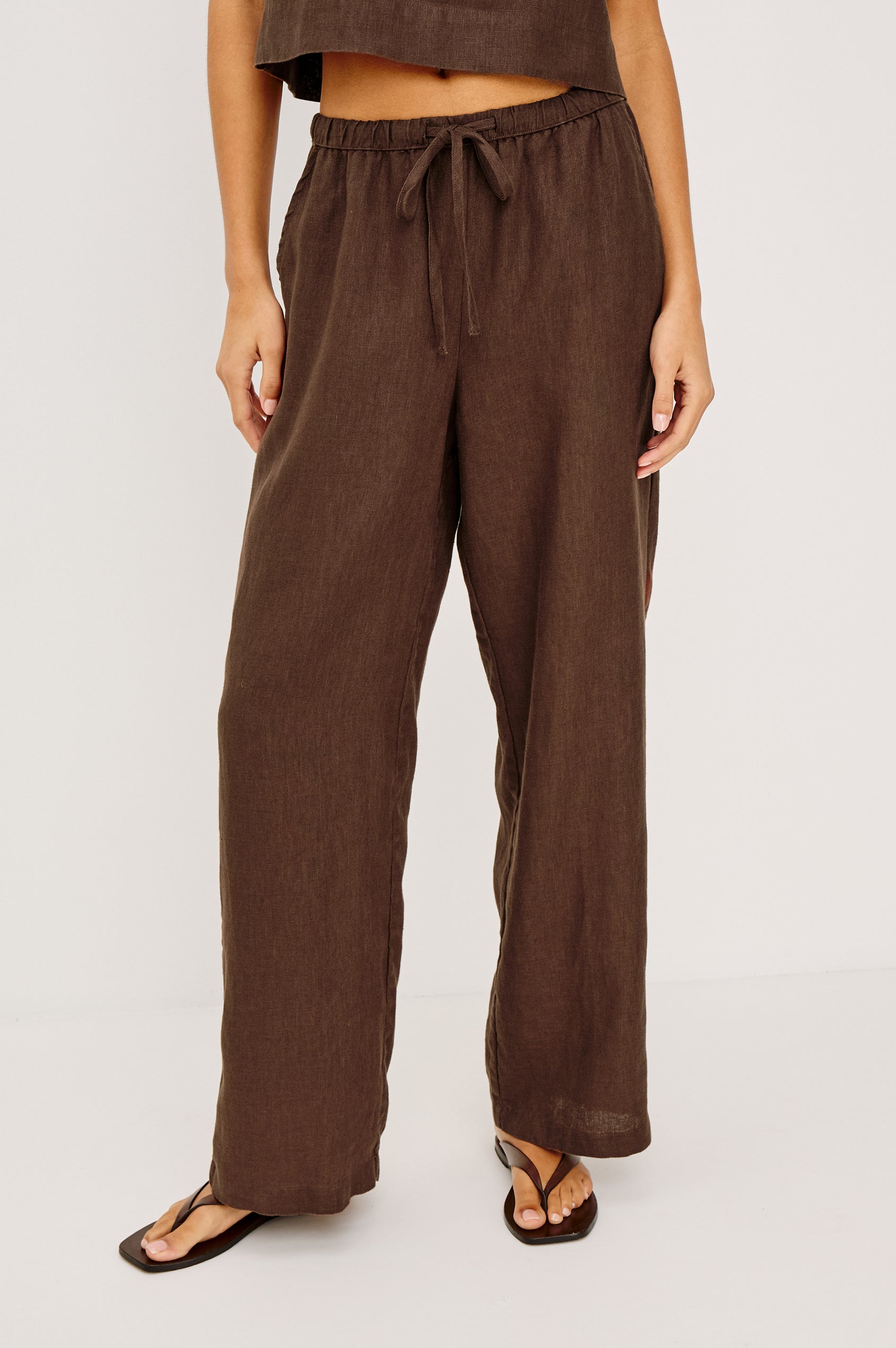 Emmie Straight Leg Pant in Linen With Adjustable Drawstring Waist Ties â€” Lower Body Front View Featured on Model