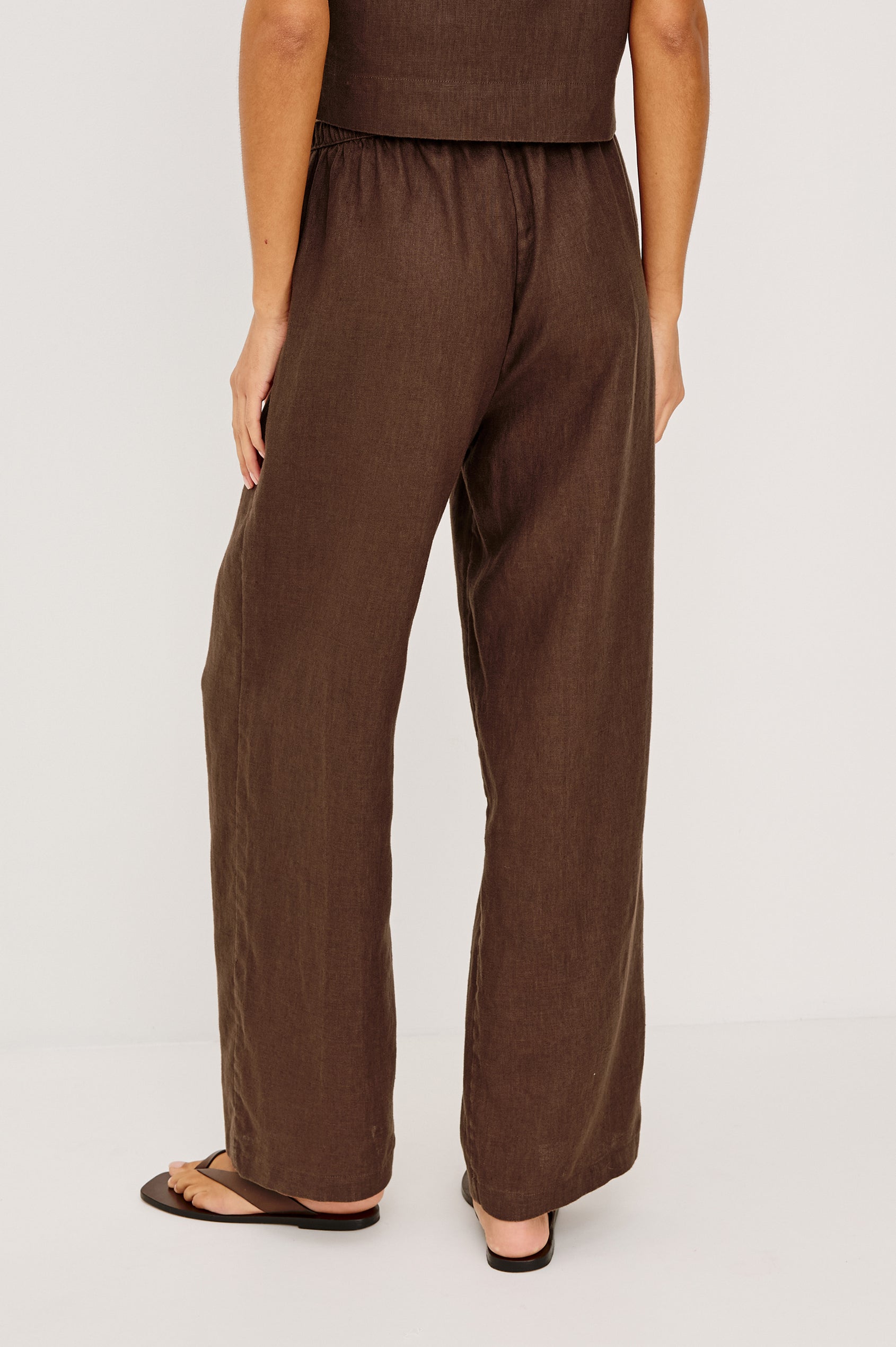 Emmie Straight Leg Pant in Linen With Adjustable Drawstring Waist Ties â€” Lower Body Front View Featured on Model