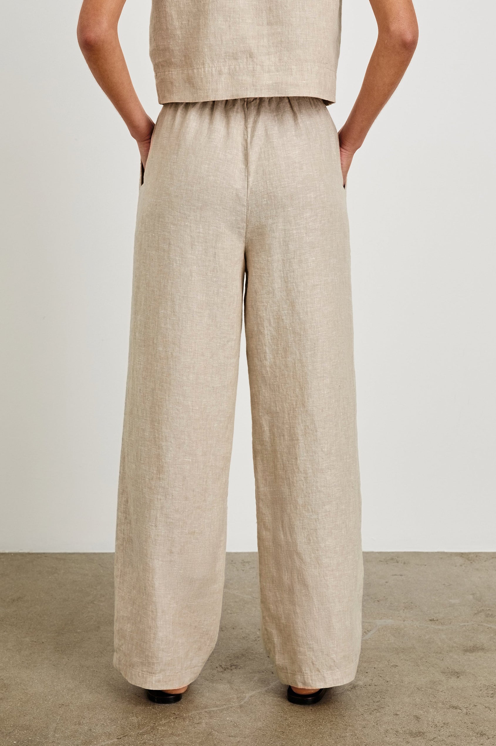 Emmie high rise linen wide leg pant with drawstring in Heathered Flax -  back view on model