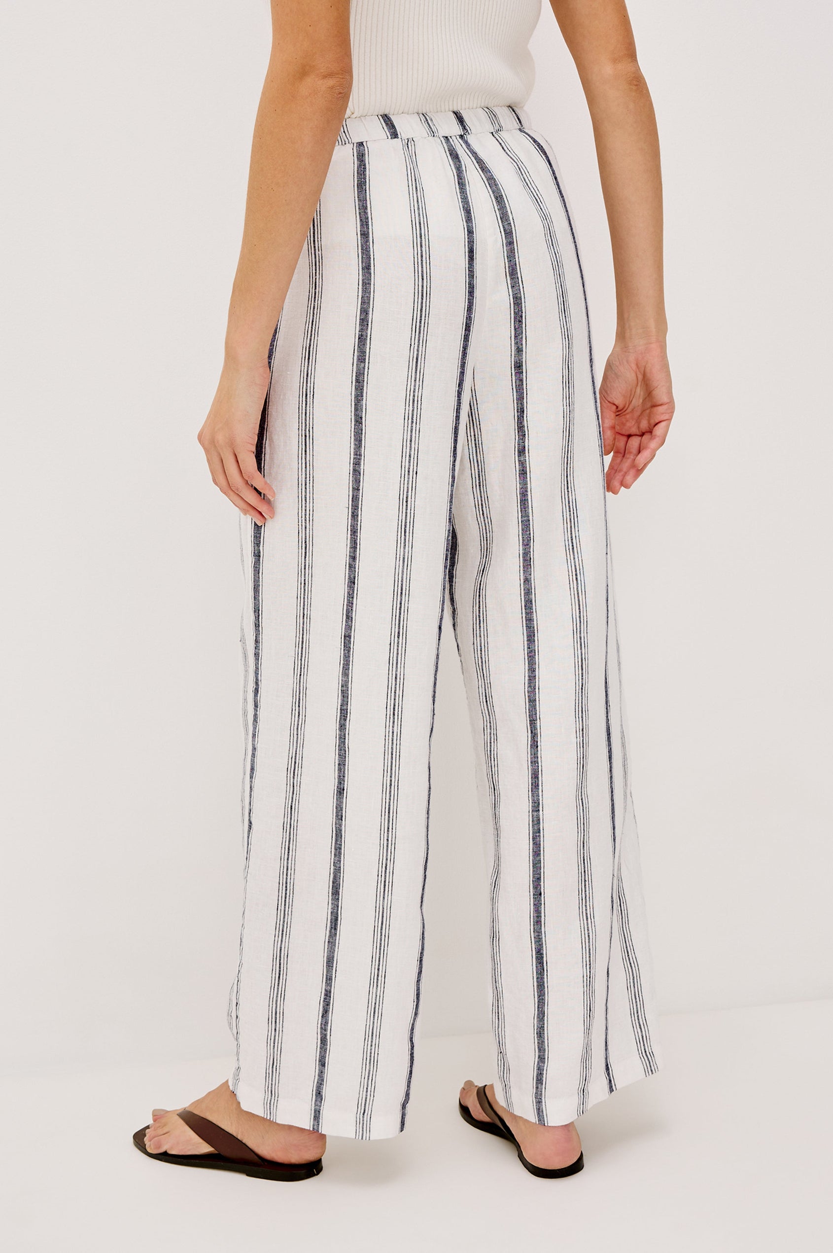 Emmie high rise linen wide leg pant with drawstring in Taverna Stripe colorway- back view on model.