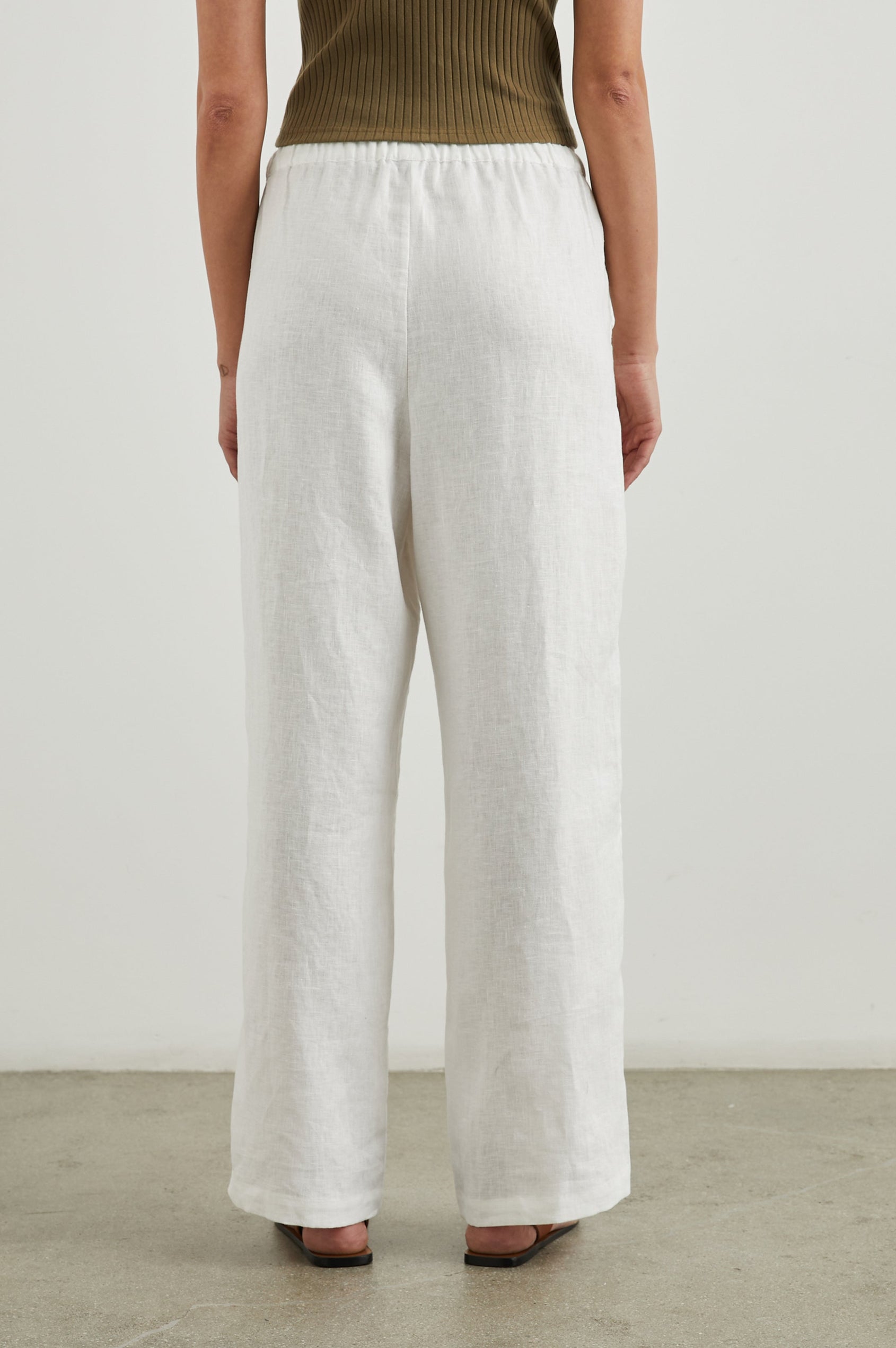 Emmie Pants with a Drawstring Waist and Two Front Pockets in White Colorway - Back View Featured on Model