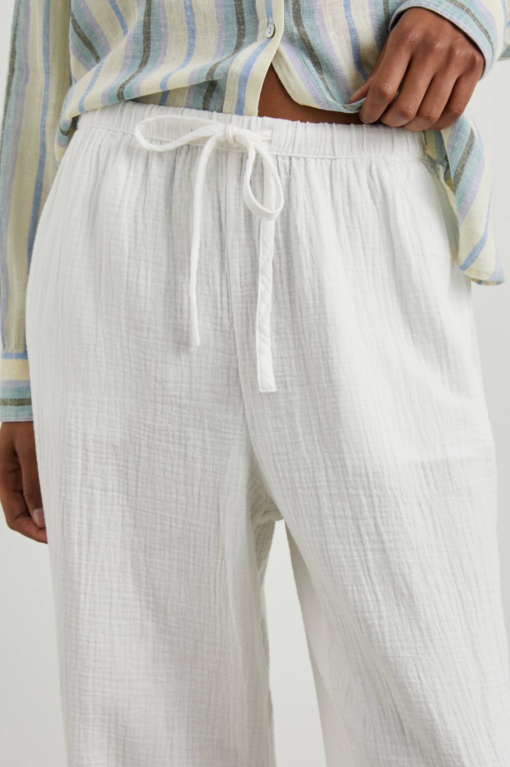 Emmie Pants with a Drawstring Waist and Two Front Pockets in Gauze White Colorway - Front View Featured on Model
