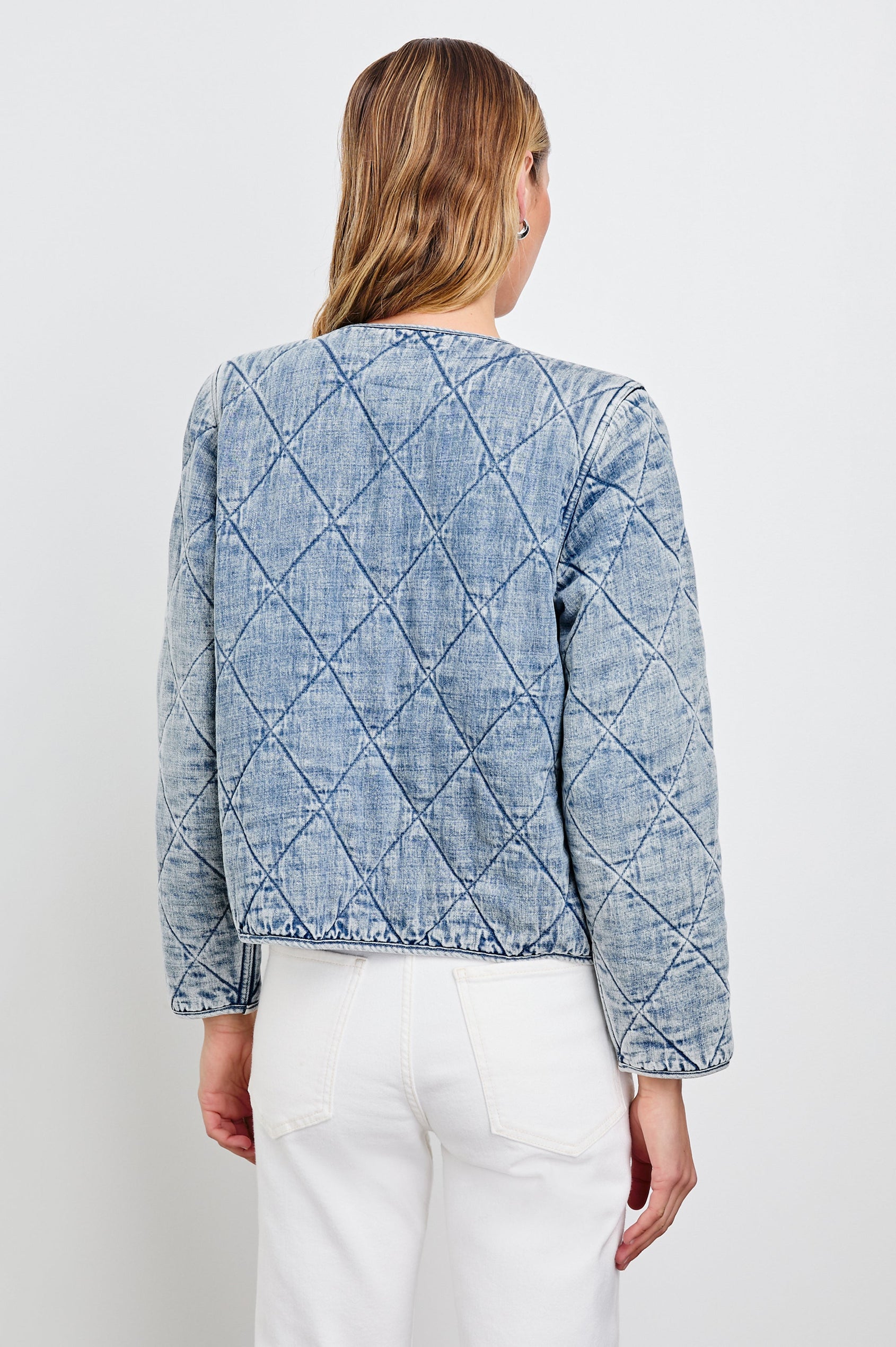 Ency Jacket with Quilted Denim, Snap Closure and Two Front Patch Pockets in Mid Blue Colorway - Back View Featured on Model