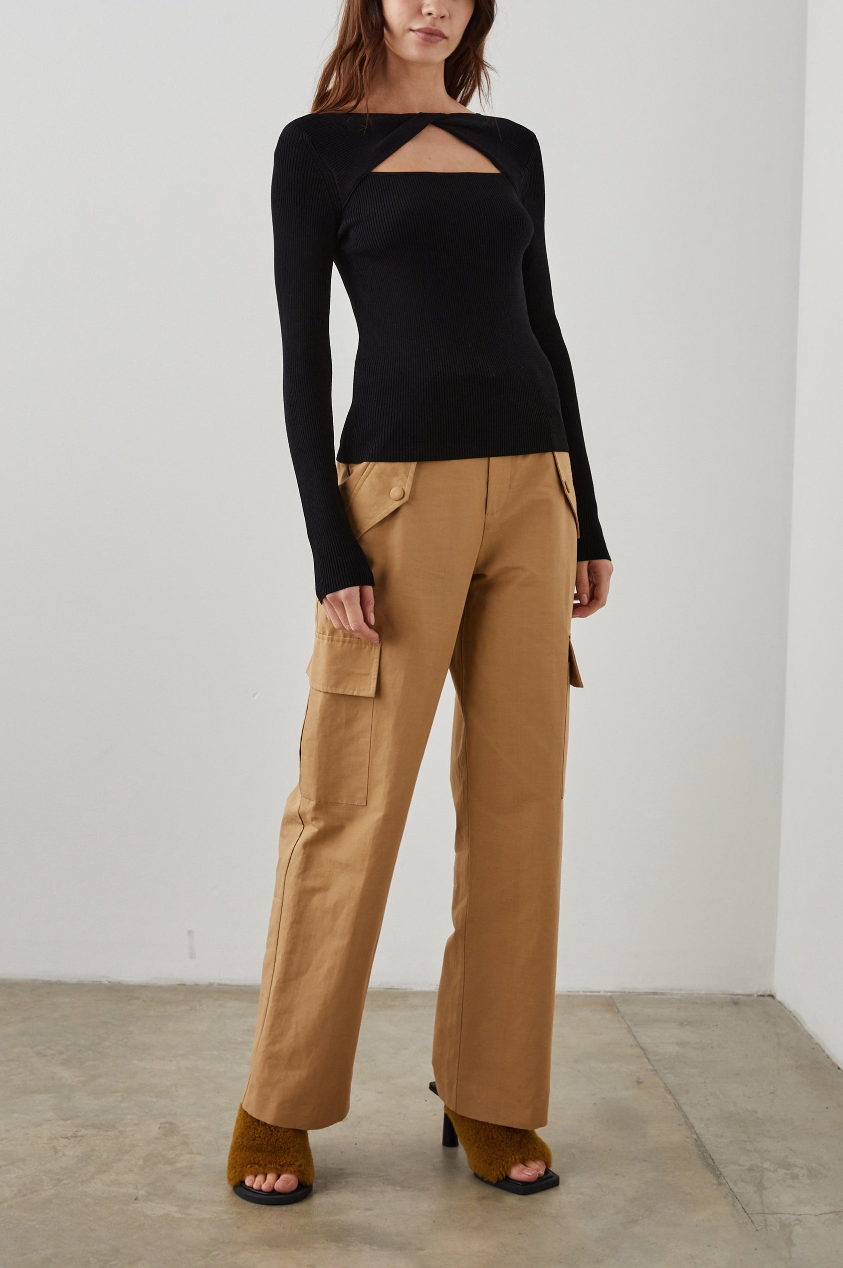 Erina Long-Sleeve Ribbed Top with a Boat Neck, Twisted Fabric and a Cutout at the Neck in Erina Colorway - Front Full Body View Featured on Model 