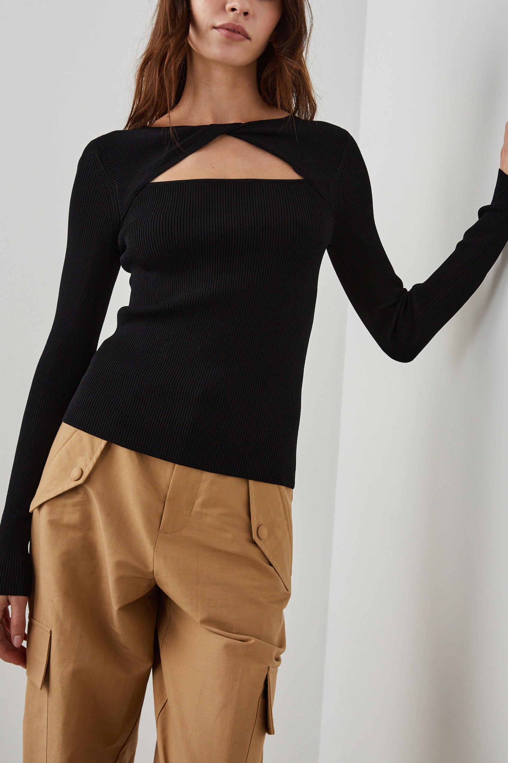 Erina Long-Sleeve Ribbed Top with a Boat Neck, Twisted Fabric and a Cutout at the Neck in Erina Colorway - Front View Featured on Model 