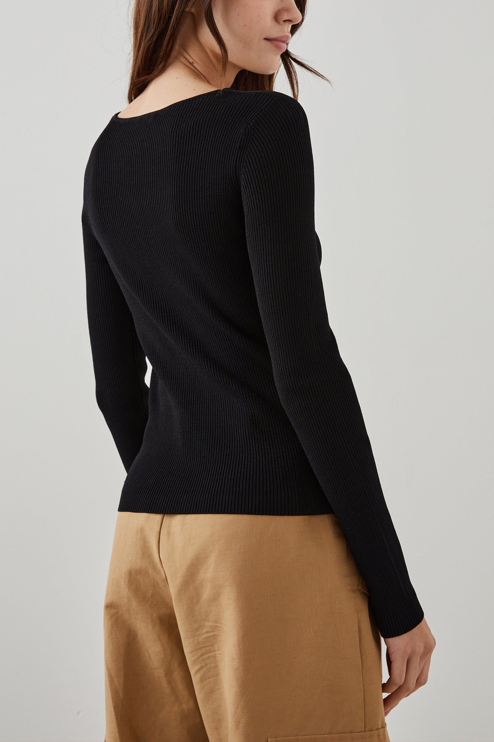 Erina Long-Sleeve Ribbed Top with a Boat Neck, Twisted Fabric and a Cutout at the Neck in Erina Colorway - Back View Featured on Model 