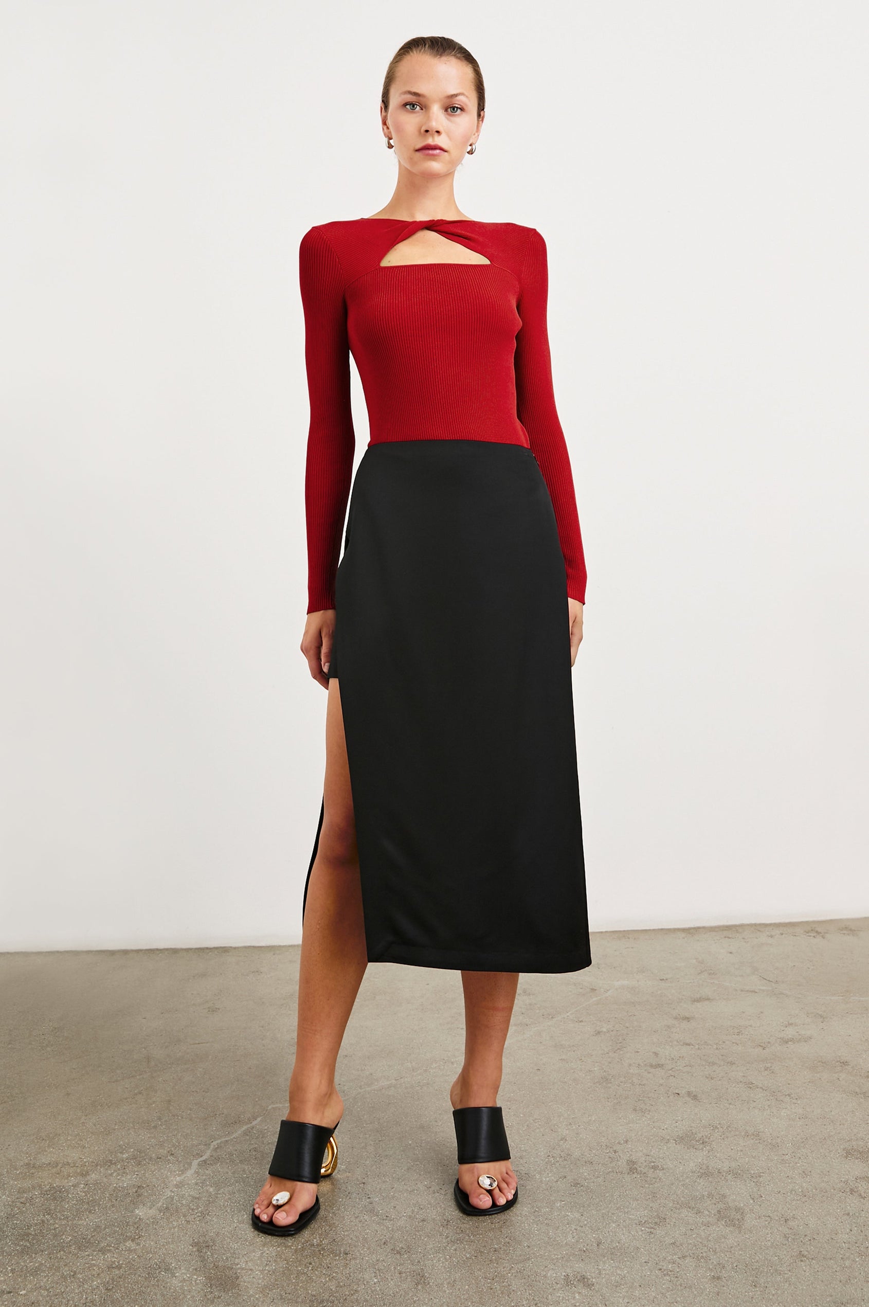 Erina Long-Sleeve Ribbed Top with a Boat Neck, Twisted Fabric and a Cutout at the Neck in Cherry Colorway - Front Full Body View Featured on Model 