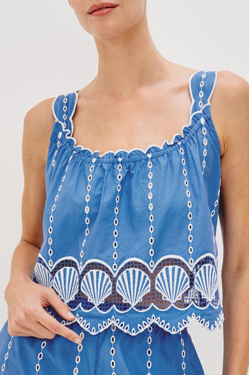 Esperanza Scoop Neck Tank Top with Sea Shell Embroidery and Scalloped Hems in French Blue Colorway. Front Detail View Shown on Model.