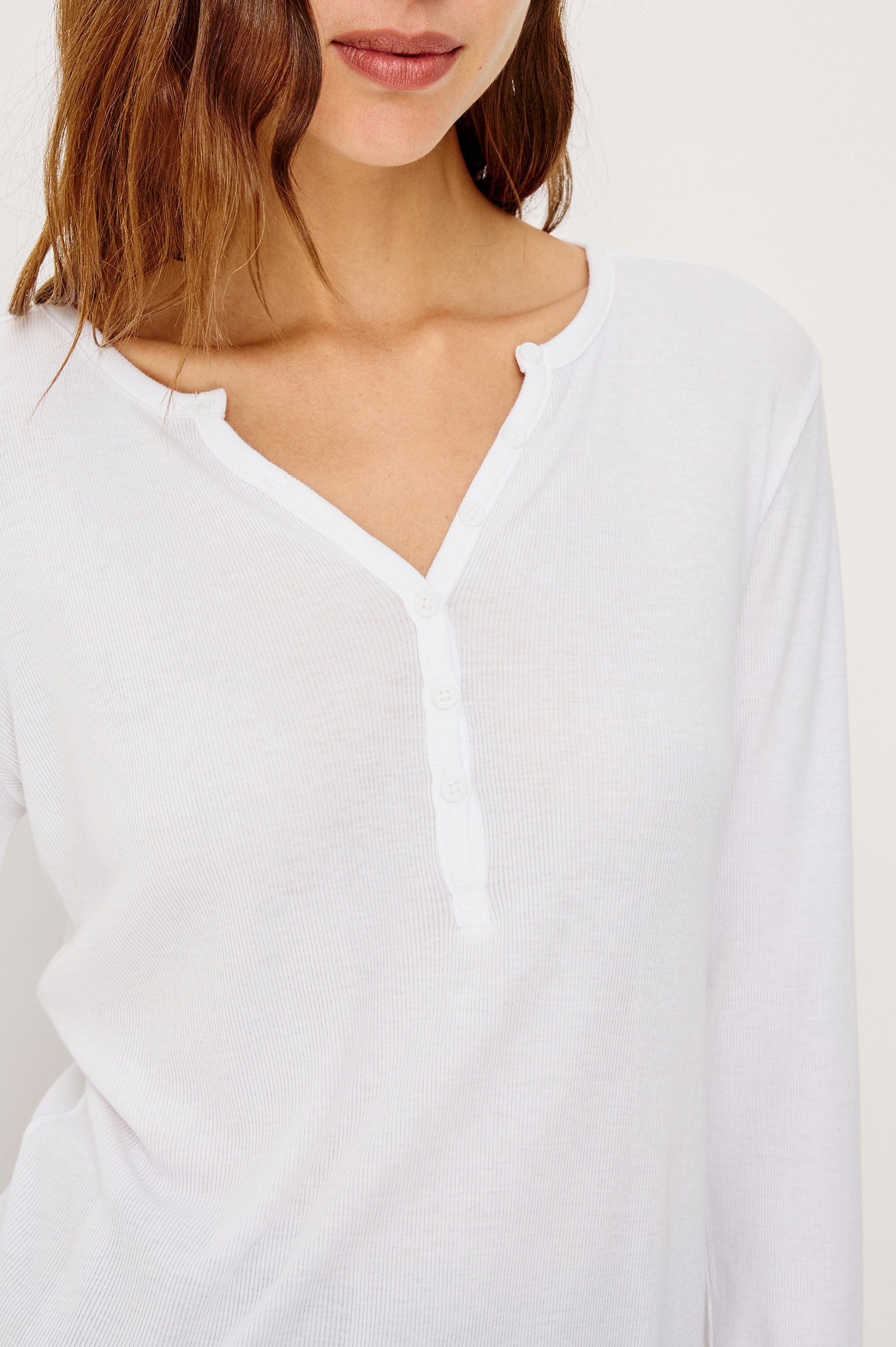 Essential Ribbed Henley With Front Placket and Long Sleeves in White Colorway - Upper Body Close Up Front View Featured on Model