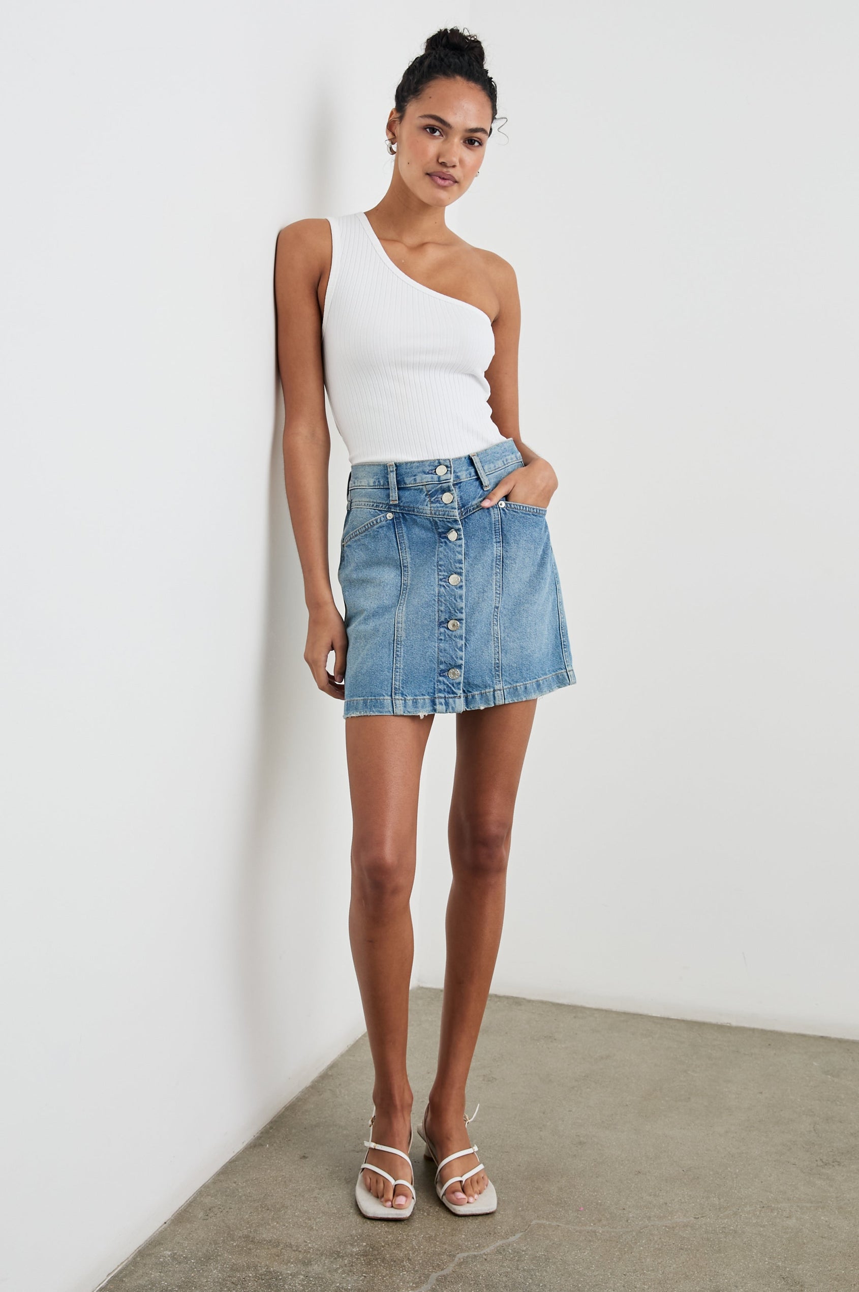 Esti Sleeveless Ribbed Top with an Asymmetrical Neckline with One Strap in White Colorway - Front Tucked Full Body View Featured on Model