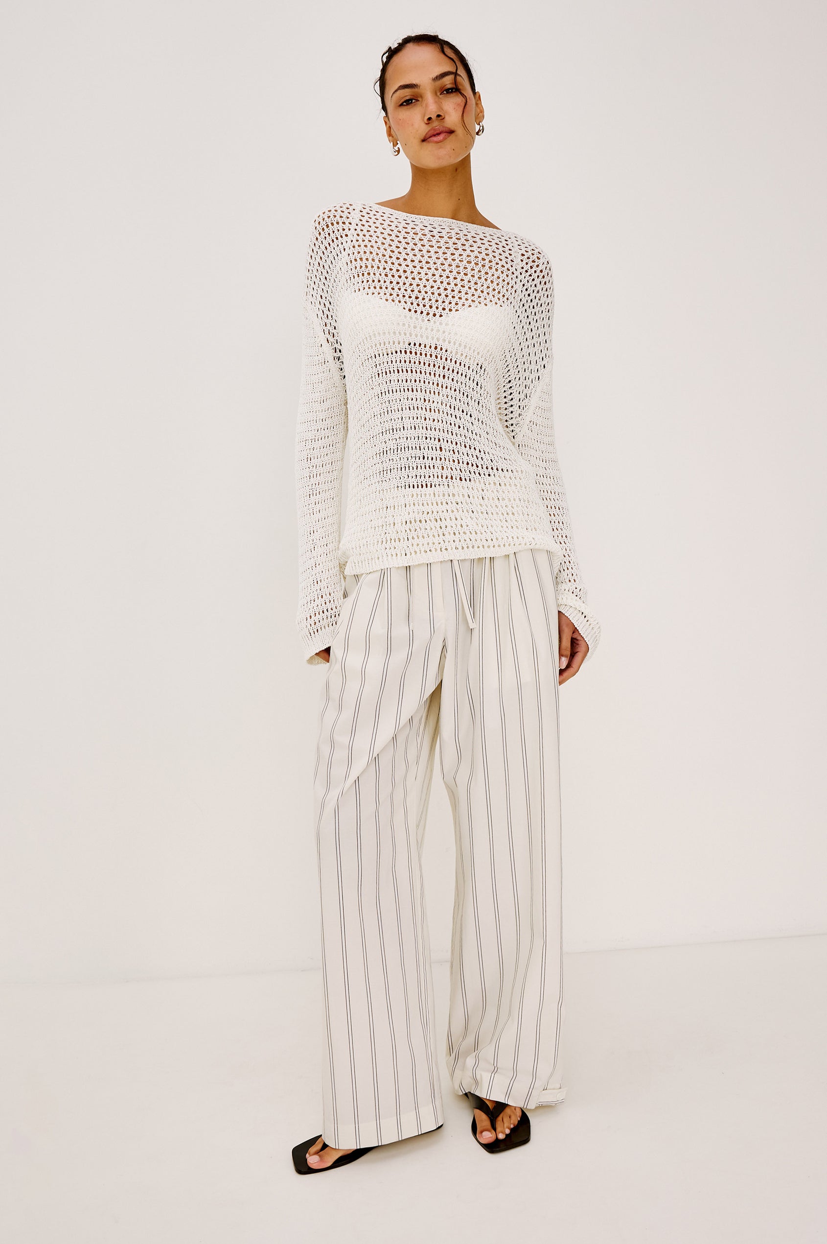 Evangeline Open Knit Oversized Sweater With Dropped Shoulders and Long Sleeves in Ivory Colorway - Full Body Front View Featured on Model