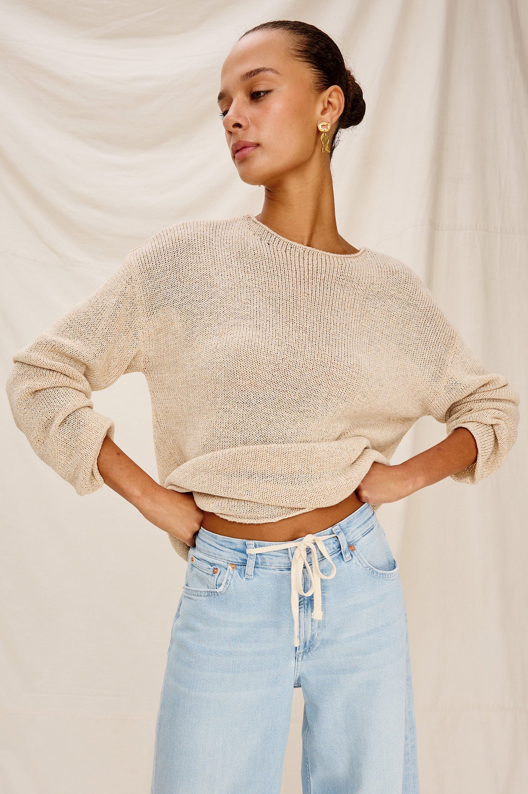 Evangeline Crew Neck Sweater with Long Sleeves in Natural Colorway. Front  Stylized View Shown on Model.