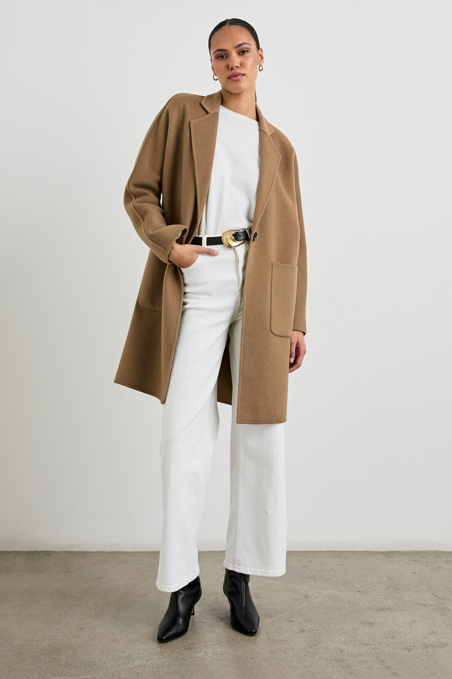 Everest Mid-Thigh Length Coat with Single Button Closure, Notched Lapels and Front Patch Pockets in Camel Colorway - Front Full Body View Featured on Model