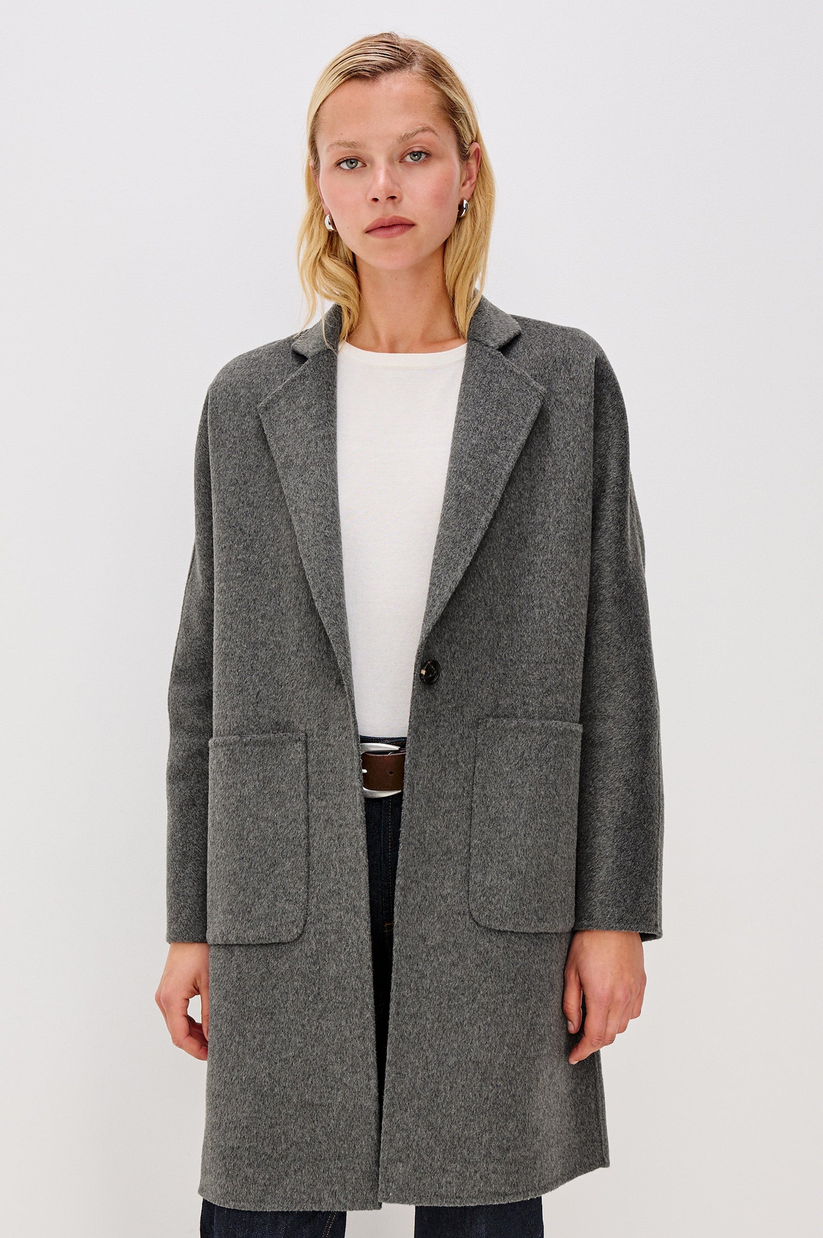 Everest Mid-Thigh Length Coat with Single Button Closure, Notched Lapels and Front Patch Pockets in Charcoal Colorway - Front View Featured on Model