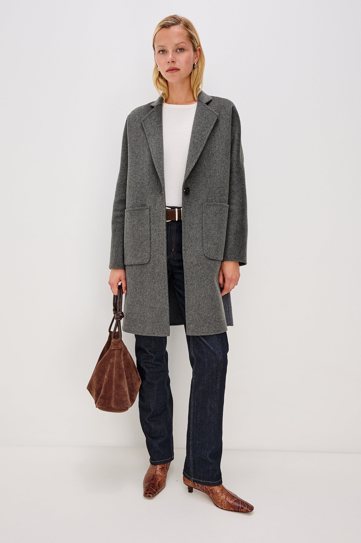 Everest Mid-Thigh Length Coat with Single Button Closure, Notched Lapels and Front Patch Pockets in Charcoal Colorway - Front Full Body View Featured on Model