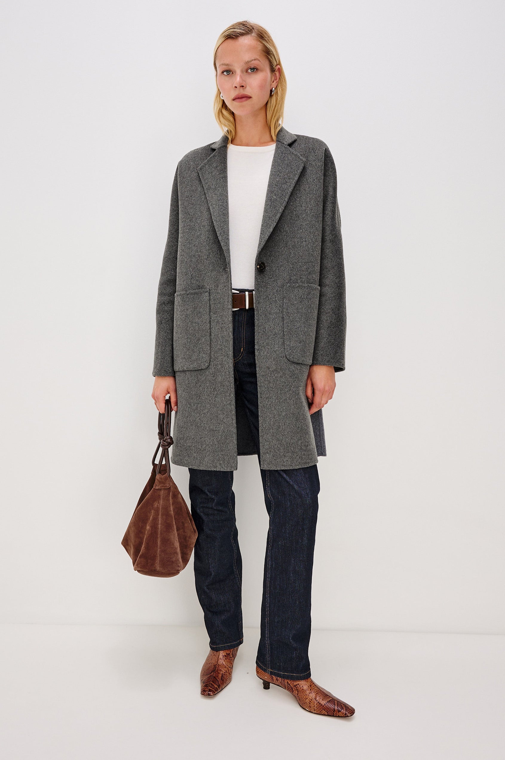 Everest Mid-Thigh Length Coat with Single Button Closure, Notched Lapels and Front Patch Pockets in Charcoal Colorway - Front Full Body View Featured on Model