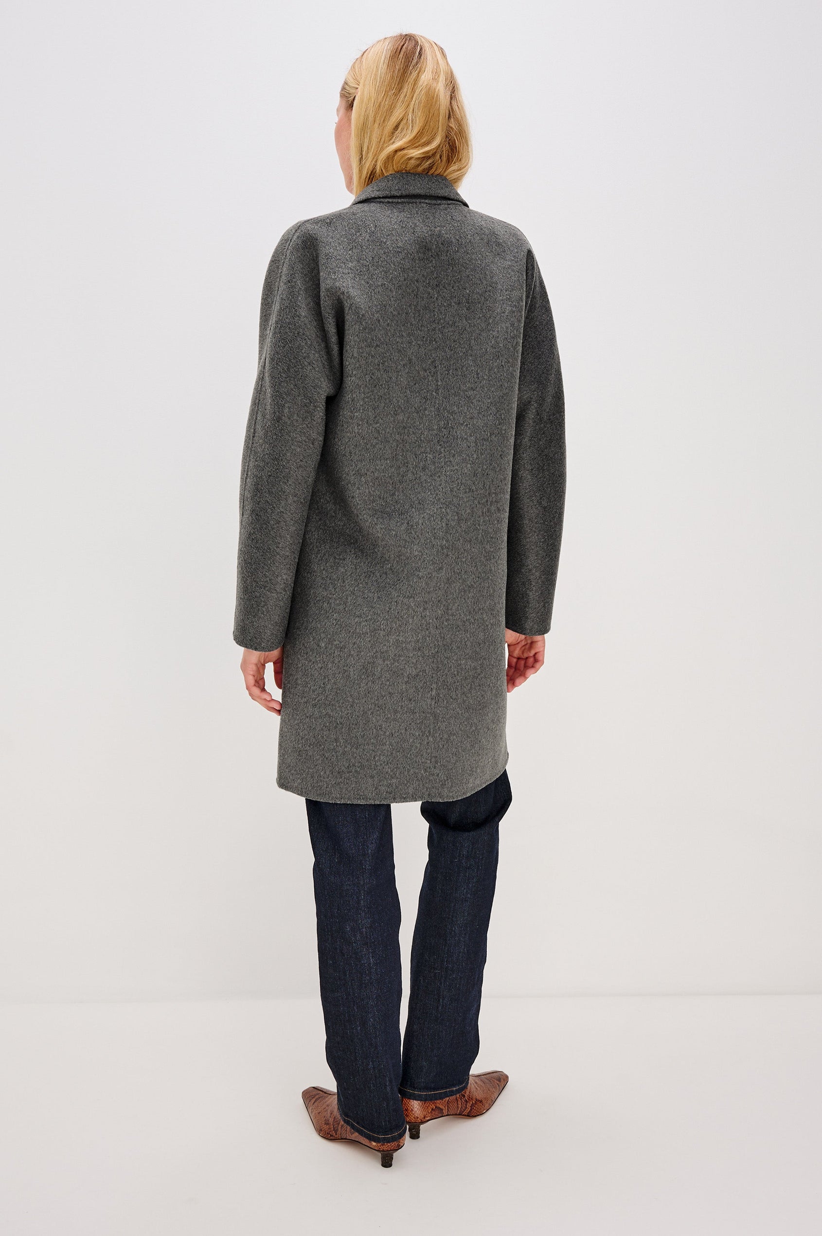 Everest Mid-Thigh Length Coat with Single Button Closure, Notched Lapels and Front Patch Pockets in Charcoal Colorway - Back View Featured on Model
