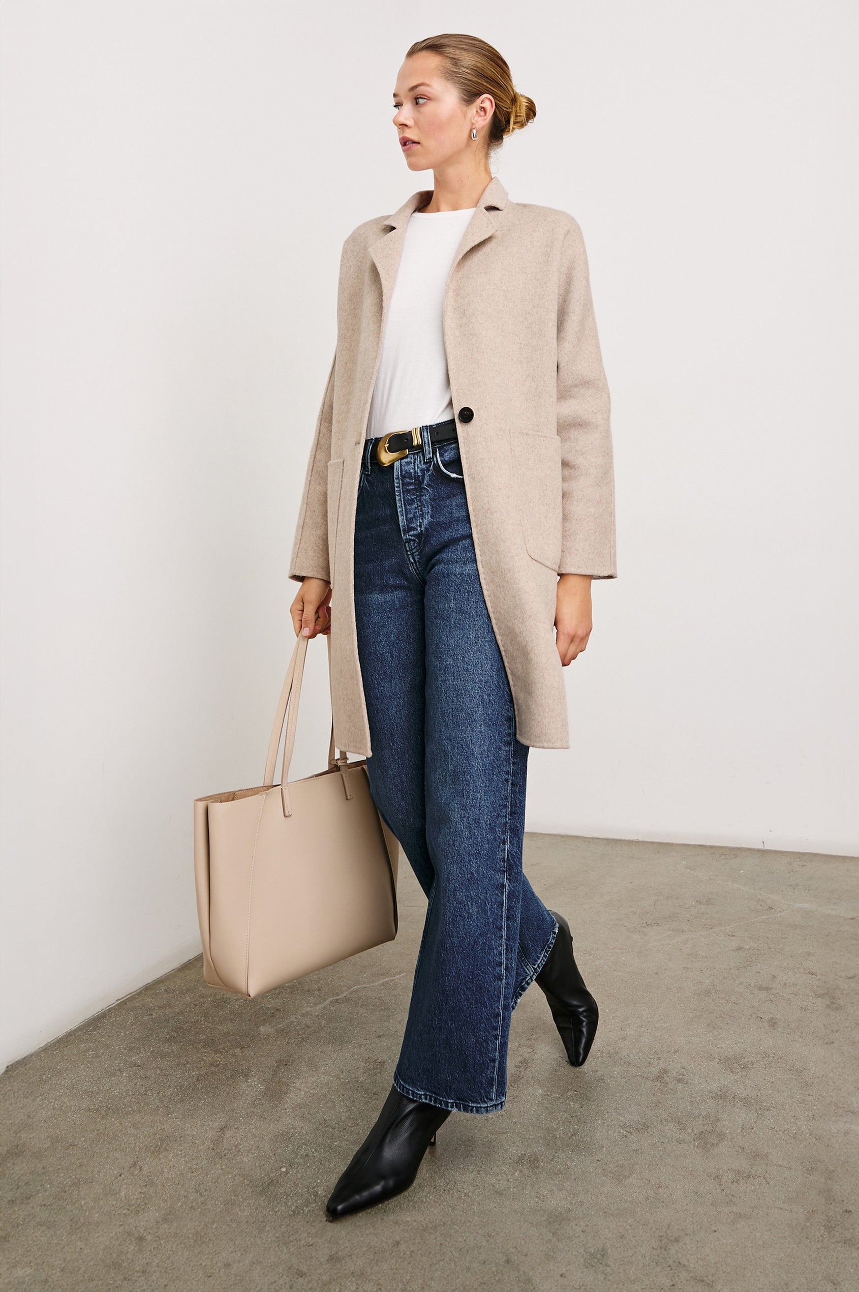 Everest Mid-Thigh Length Coat with Single Button Closure, Notched Lapels and Front Patch Pockets in Oatmeal Colorway - Front Full Body View Featured on Model