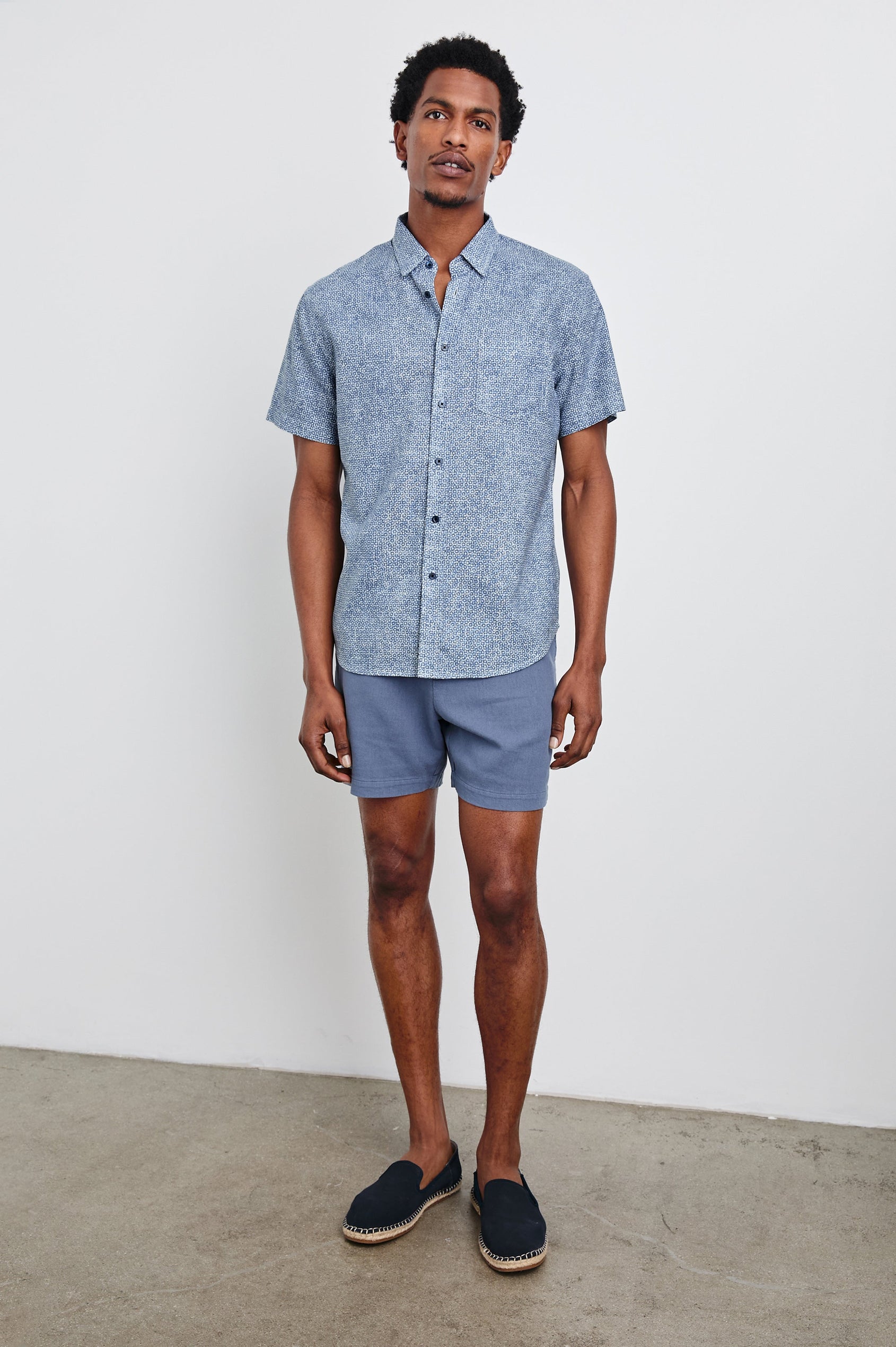 Fairfax short sleeve button up shirt with collar in Abstract Block Blue - full body front view on model