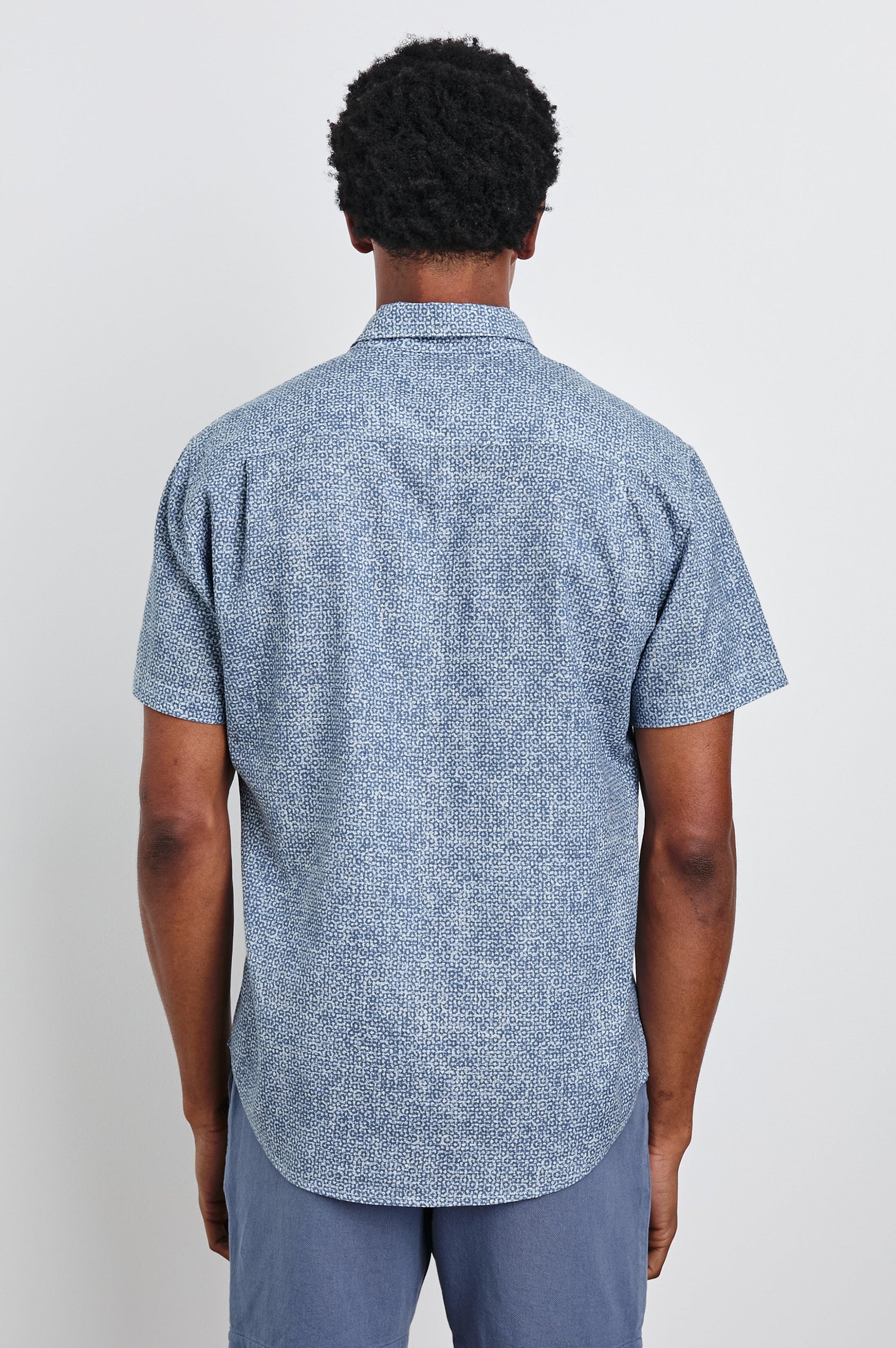 Fairfax short sleeve button up shirt with collar in Abstract Block Blue - back view on model