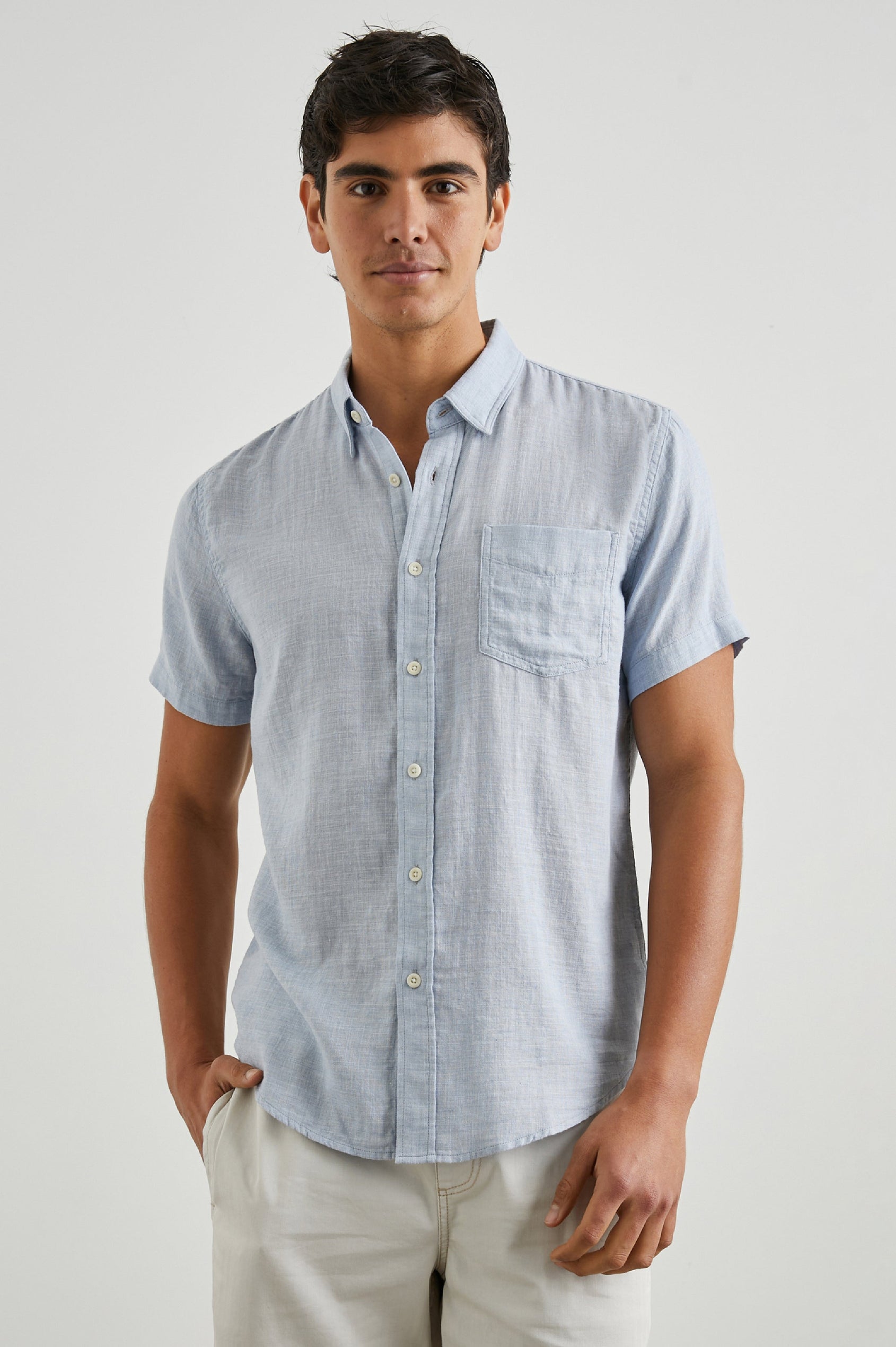 Fairfax Short-Sleeve Button Up with a Chest Patch Pocket in Blue Melange Colorway - Front View Featured on Model
