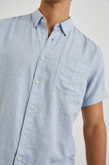 Fairfax Short-Sleeve Button Up with a Chest Patch Pocket in Blue Melange Colorway - Front View Featured on Model