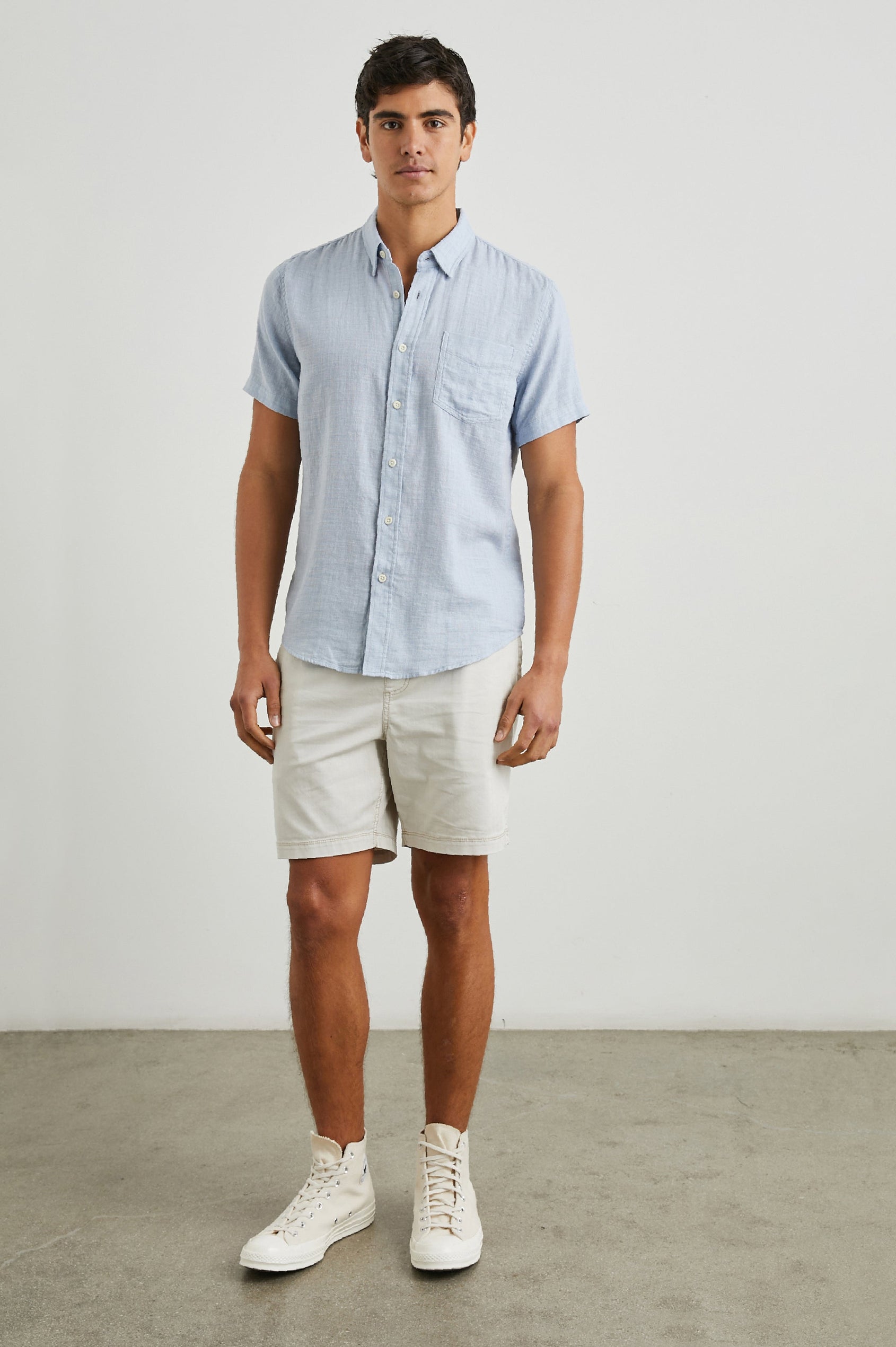 Fairfax Short-Sleeve Button Up with a Chest Patch Pocket in Blue Melange Colorway - Front Full Body View Featured on Model