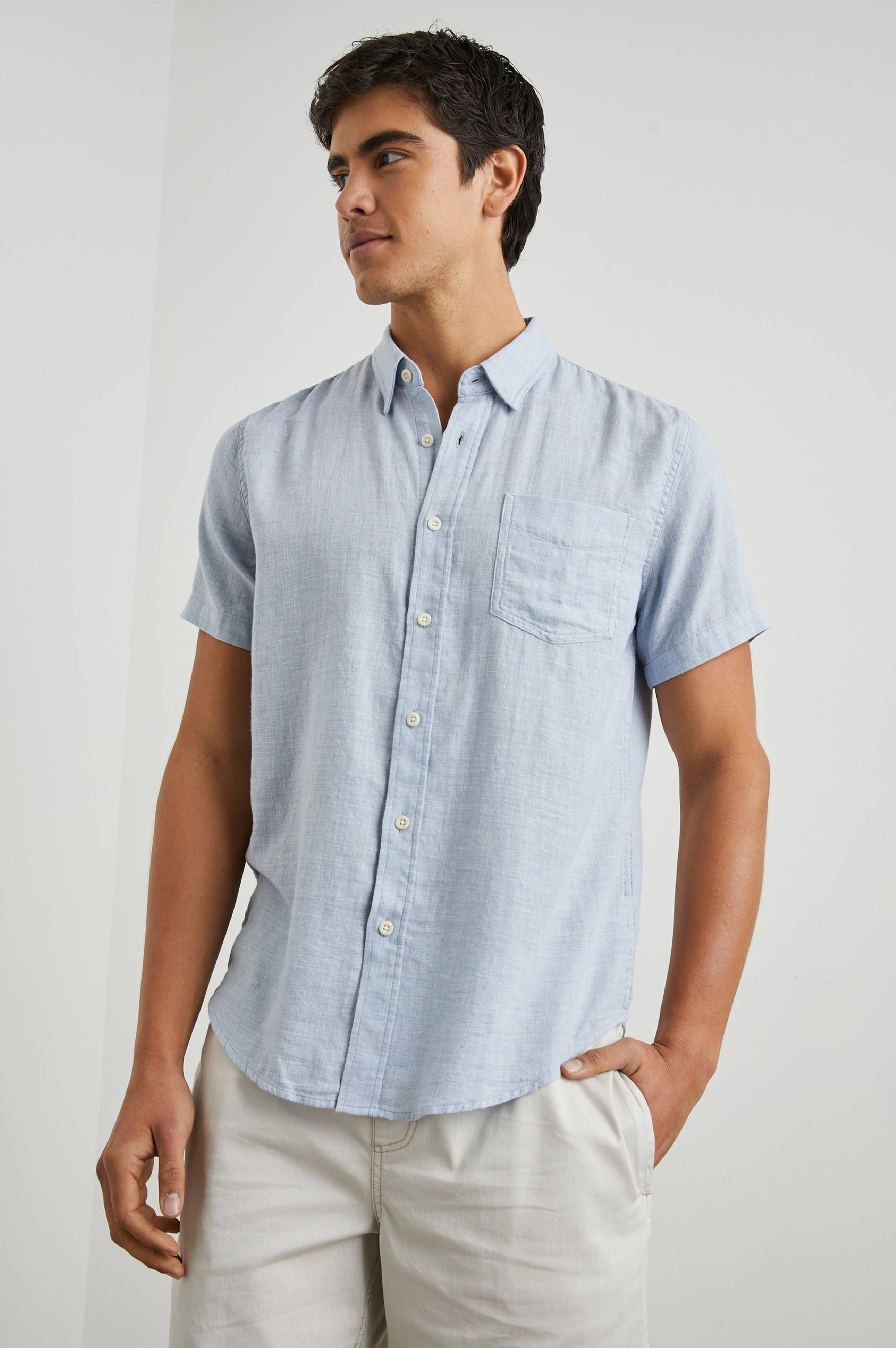 Fairfax Short-Sleeve Button Up with a Chest Patch Pocket in Blue Melange Colorway - Front View Featured on Model