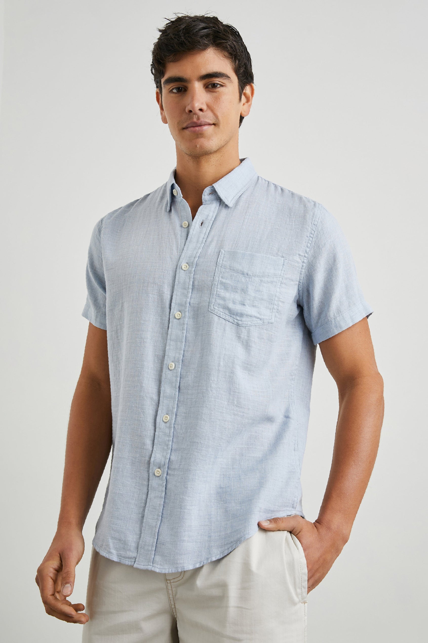 Fairfax Short-Sleeve Button Up with a Chest Patch Pocket in Blue Melange Colorway - Front View Featured on Model