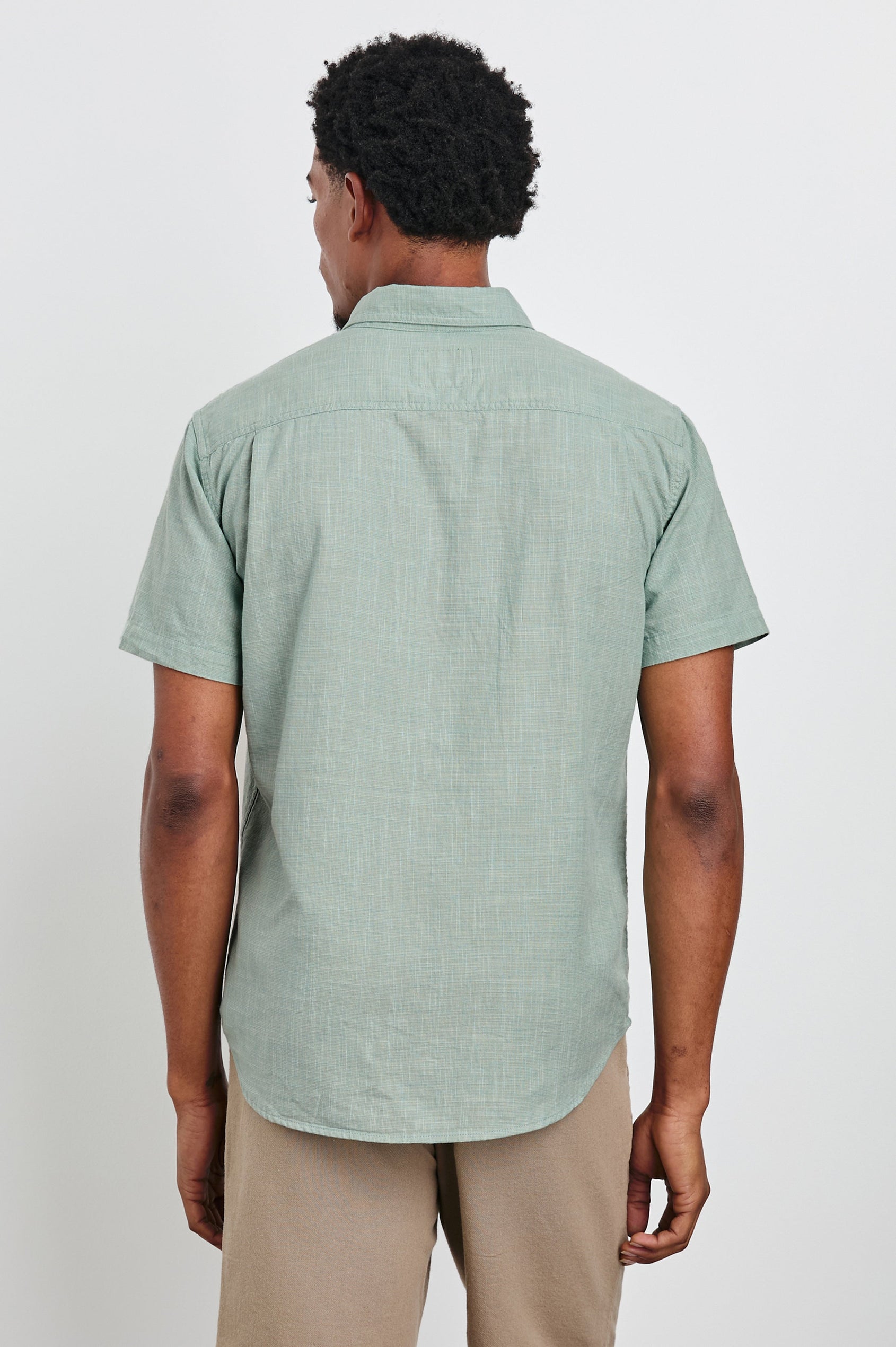 Fairfax Short-Sleeve Button Up with a Chest Patch Pocket in Borealis Etch Colorway - Back View Featured on Model