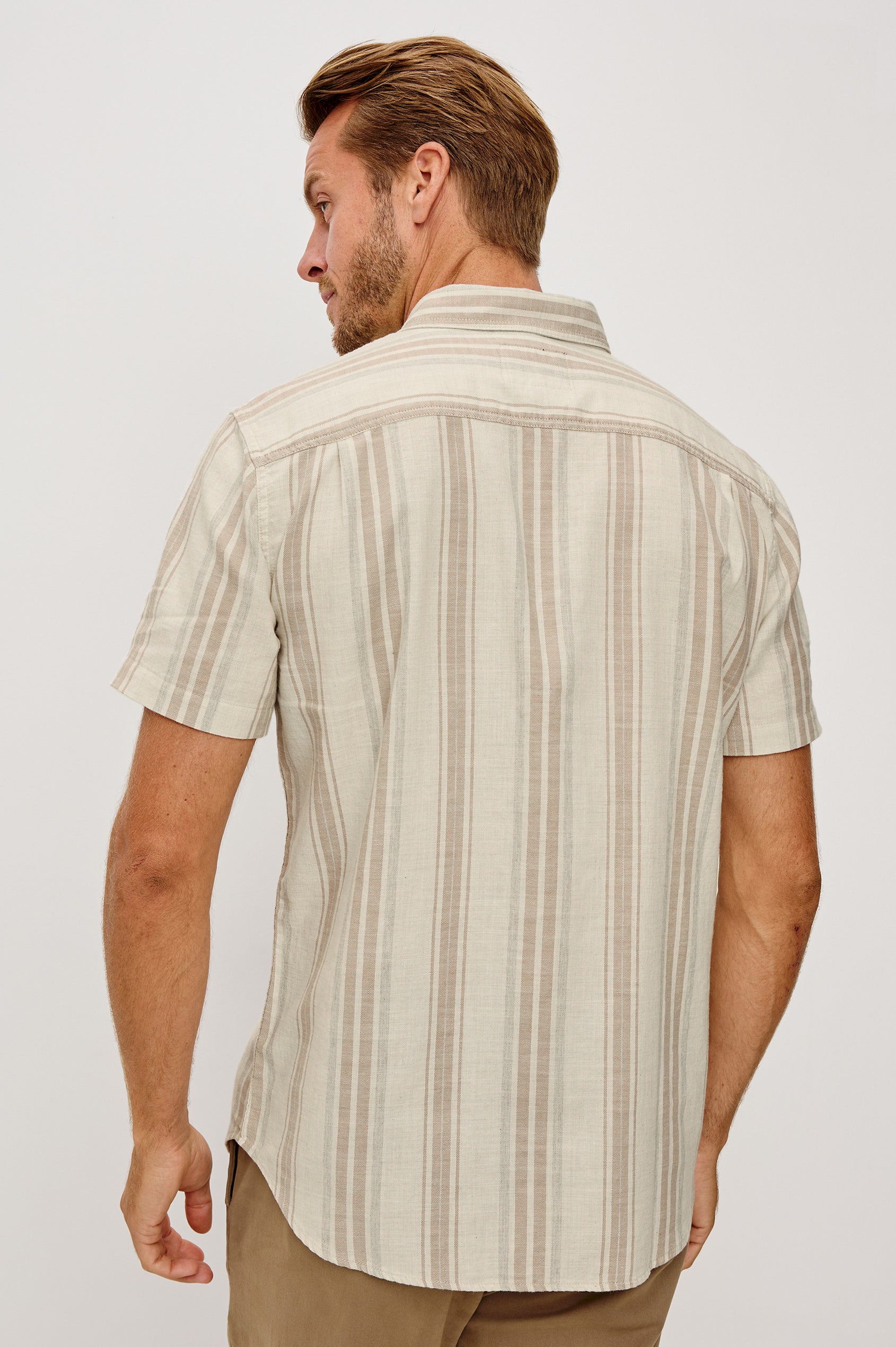 Fairfax Short Sleeve Button-Up Shirt in Lightweight Cotton With a Classic Fit in Heather Dune Sripe Colorway - Upper Body Back View Featured on Model