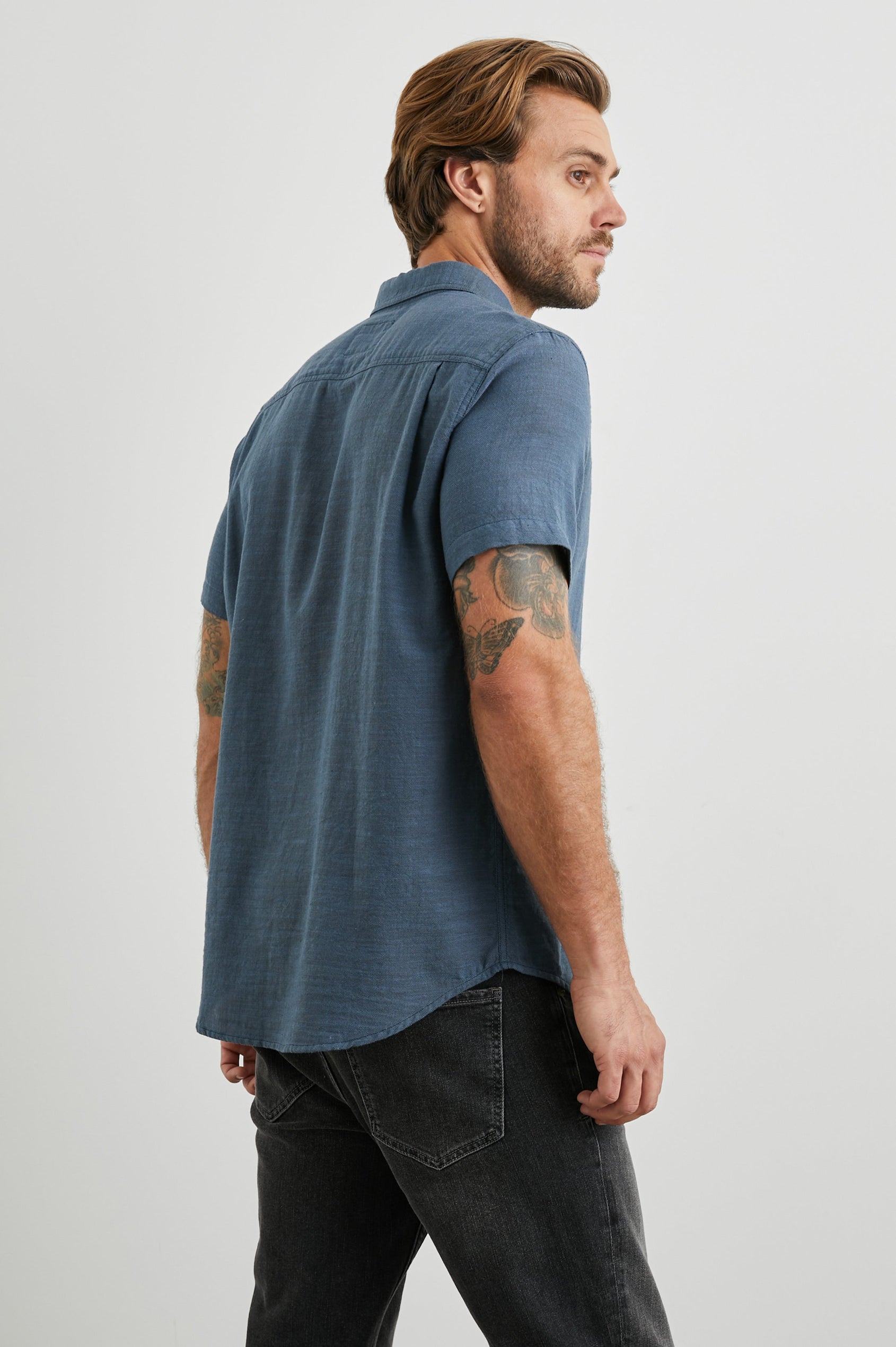 Fairfax Short-Sleeve Button Up with a Chest Patch Pocket in Sea Blue Colorway - Back View Featured on Model