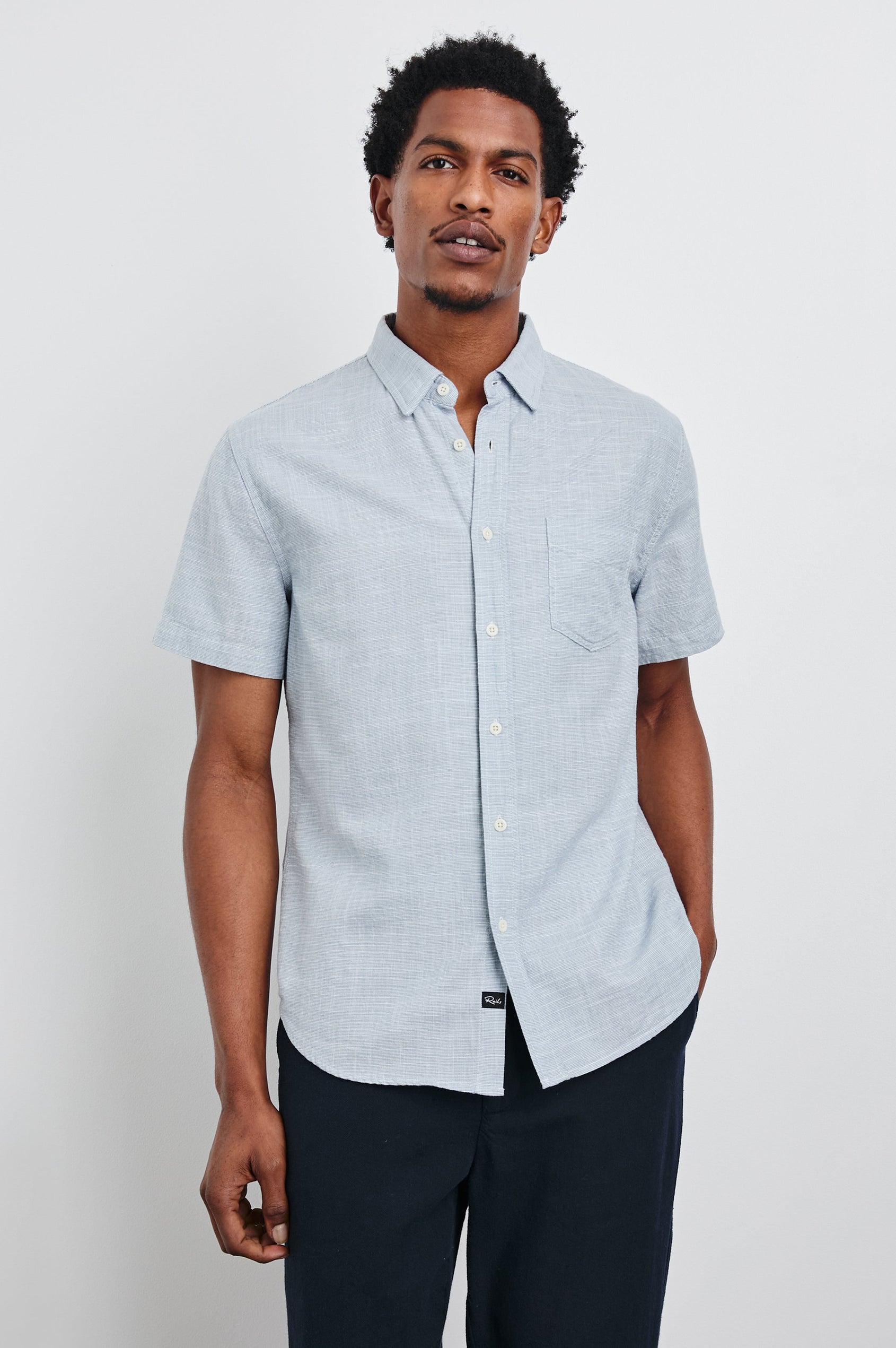 Fairfax Short-Sleeve Button Up with a Chest Patch Pocket in Tidal Etch Colorway - Front View Featured on Model